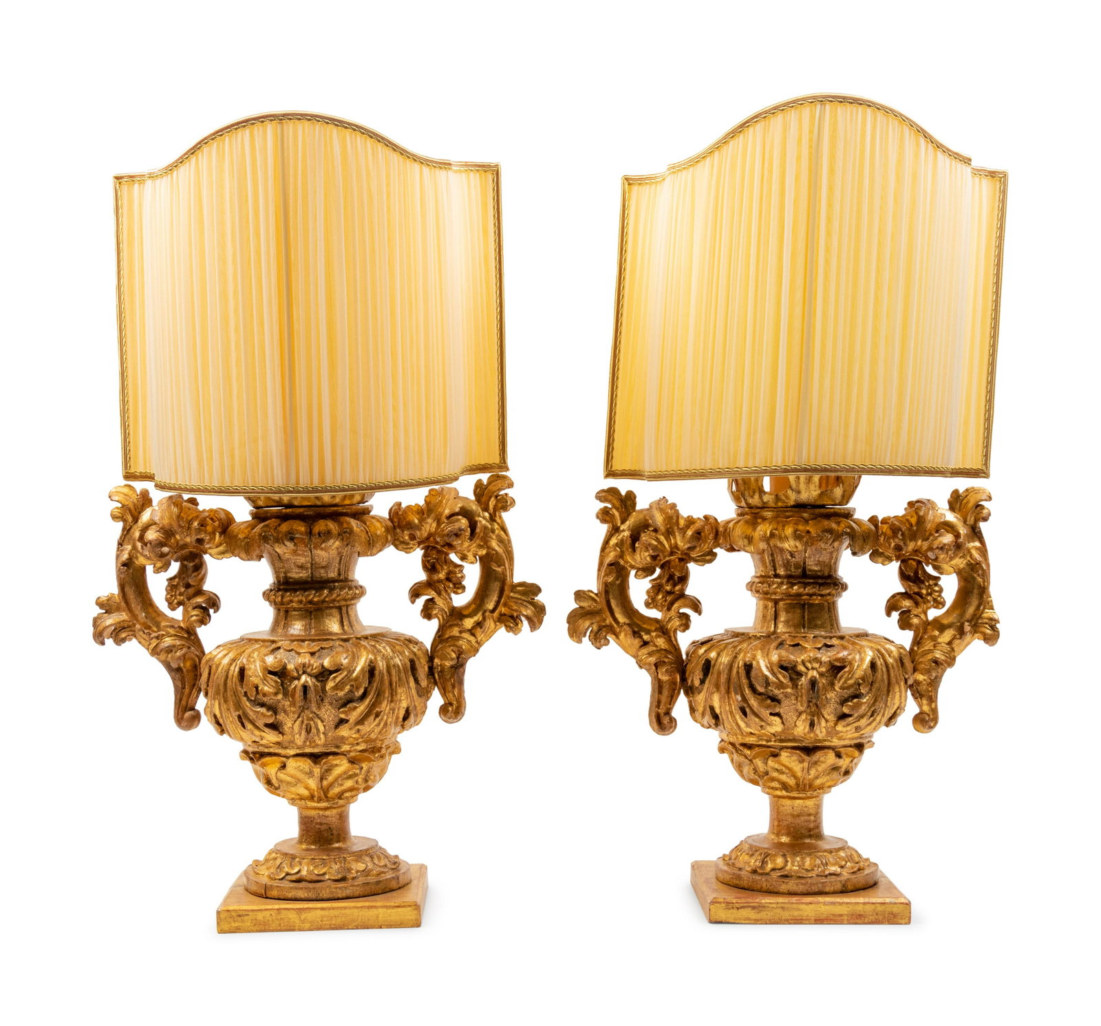 A Pair of Italian Giltwood Finials Mounted as Lamps: A Pair of Italian Giltwood Finials Mounted as Lamps with Silk Shades Late 19th/Early 20th Century Height overall 28 inches. Property from the Estate of Stephen B. Contro, Bassando del Grappa, Italy an