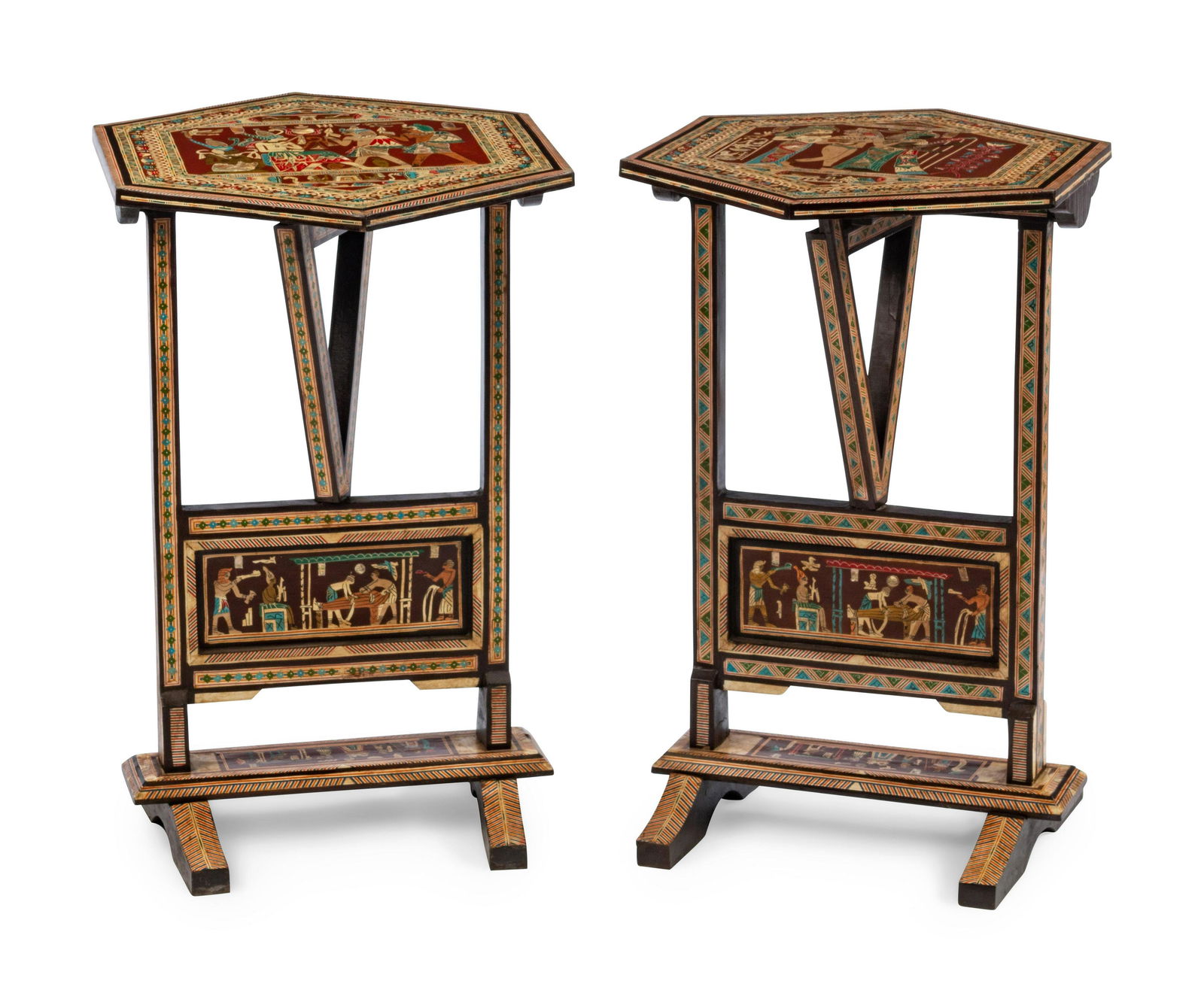 A Pair of Egyptian Revival Polychrome-Decorated and: A Pair of Egyptian Revival Polychrome-Decorated and Inlaid Tilt-Top Tables 20th Century Height 26 x width 16 x depth 16 inches.