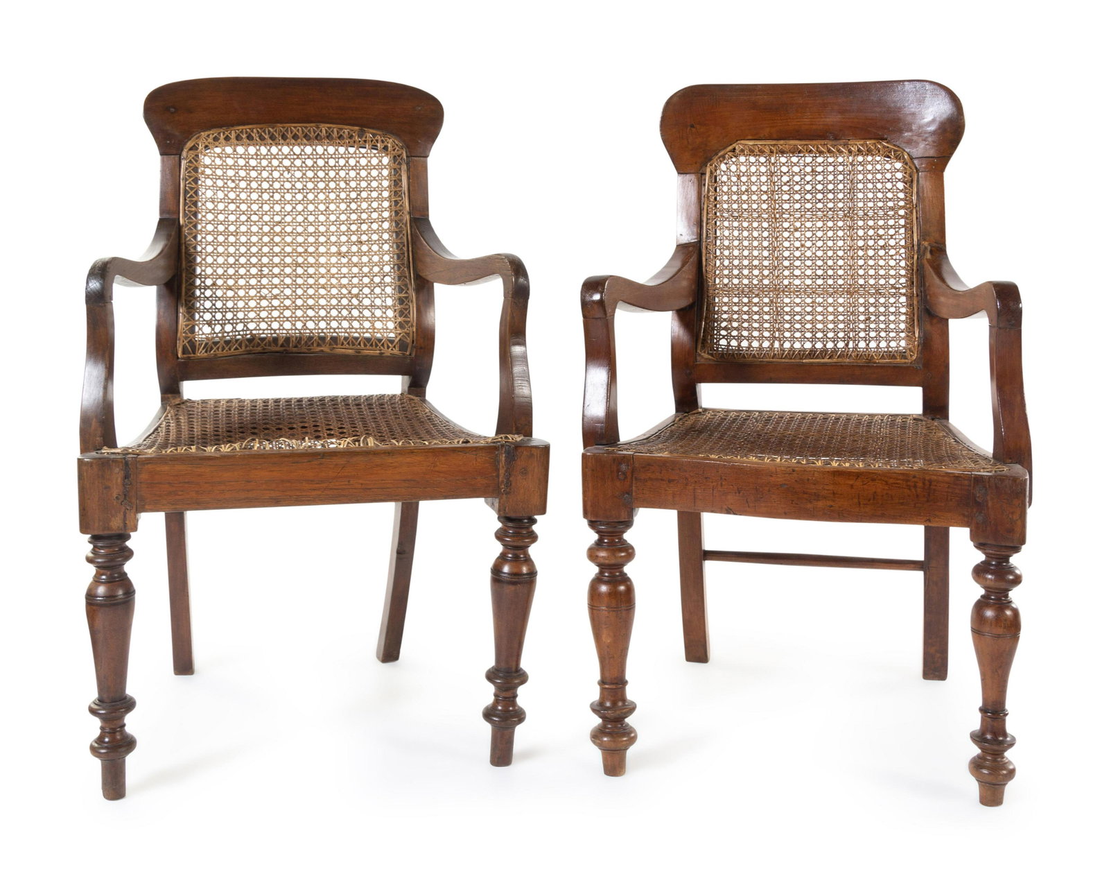 A Near Pair of Anglo-Colonial Teak Armchairs: A Near Pair of Anglo-Colonial Teak Armchairs Burma, Circa 1900 Property from the Collection of Scott Gill, Austin, Texas