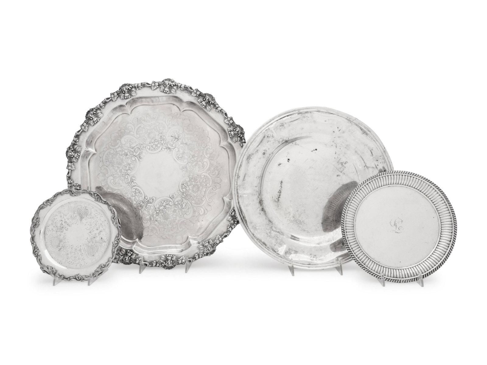 A Group of American Silver and Silver-Plate Holloware: A Group of American Silver and Silver-Plate Holloware Articles Various Makers, 19th Century and Later comprising a silver christening bowl; a mug; hand mirror; sugar basket; bowl and a dish, together 