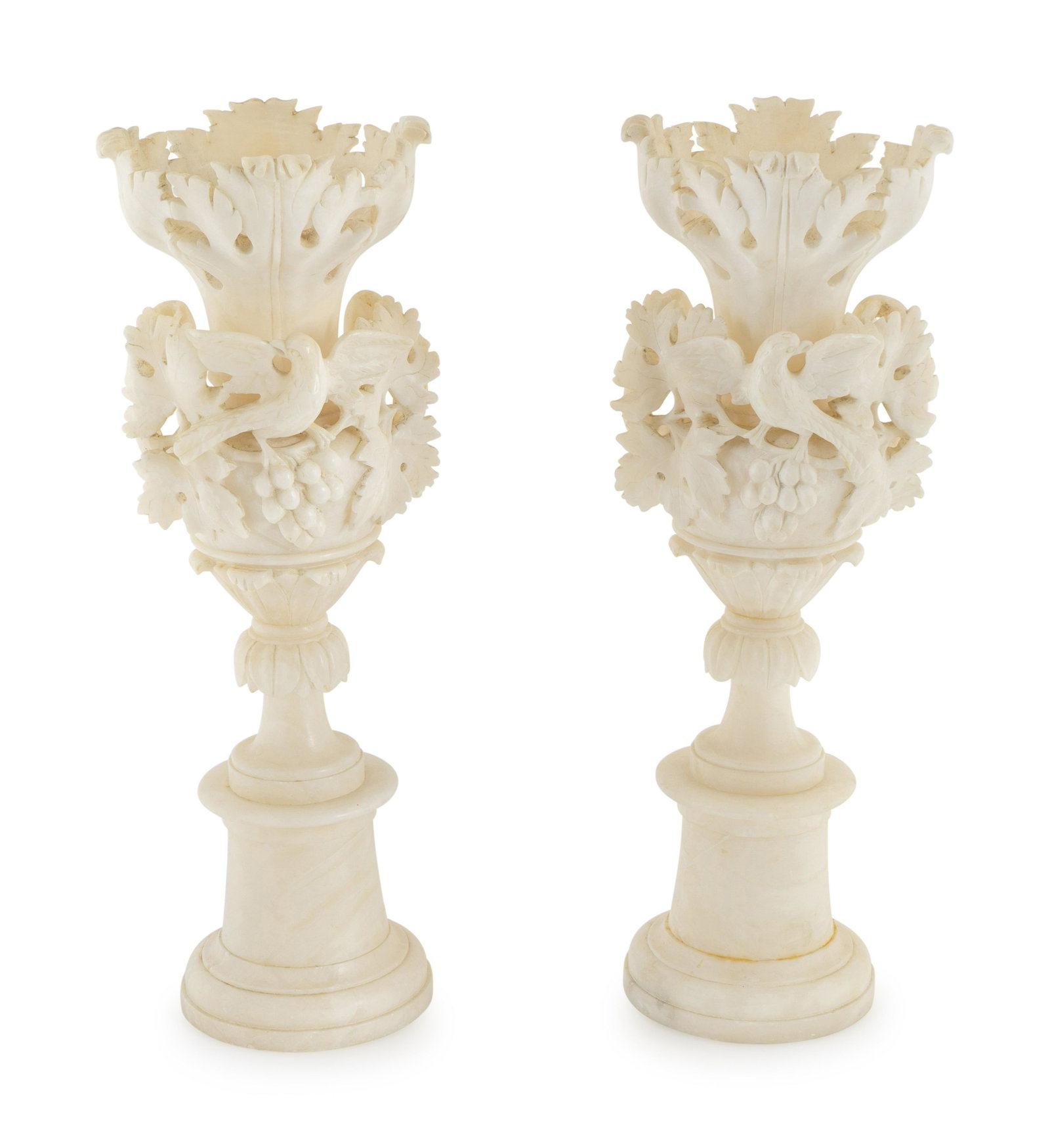 A Pair of Italian Carved Alabaster Urns Height 24: A Pair of Italian Carved Alabaster Urns 19TH CENTURY carved with grape clusters, leaves and birds. Height 24 inches. Property from a Private Collection, Palm Beach, Florida