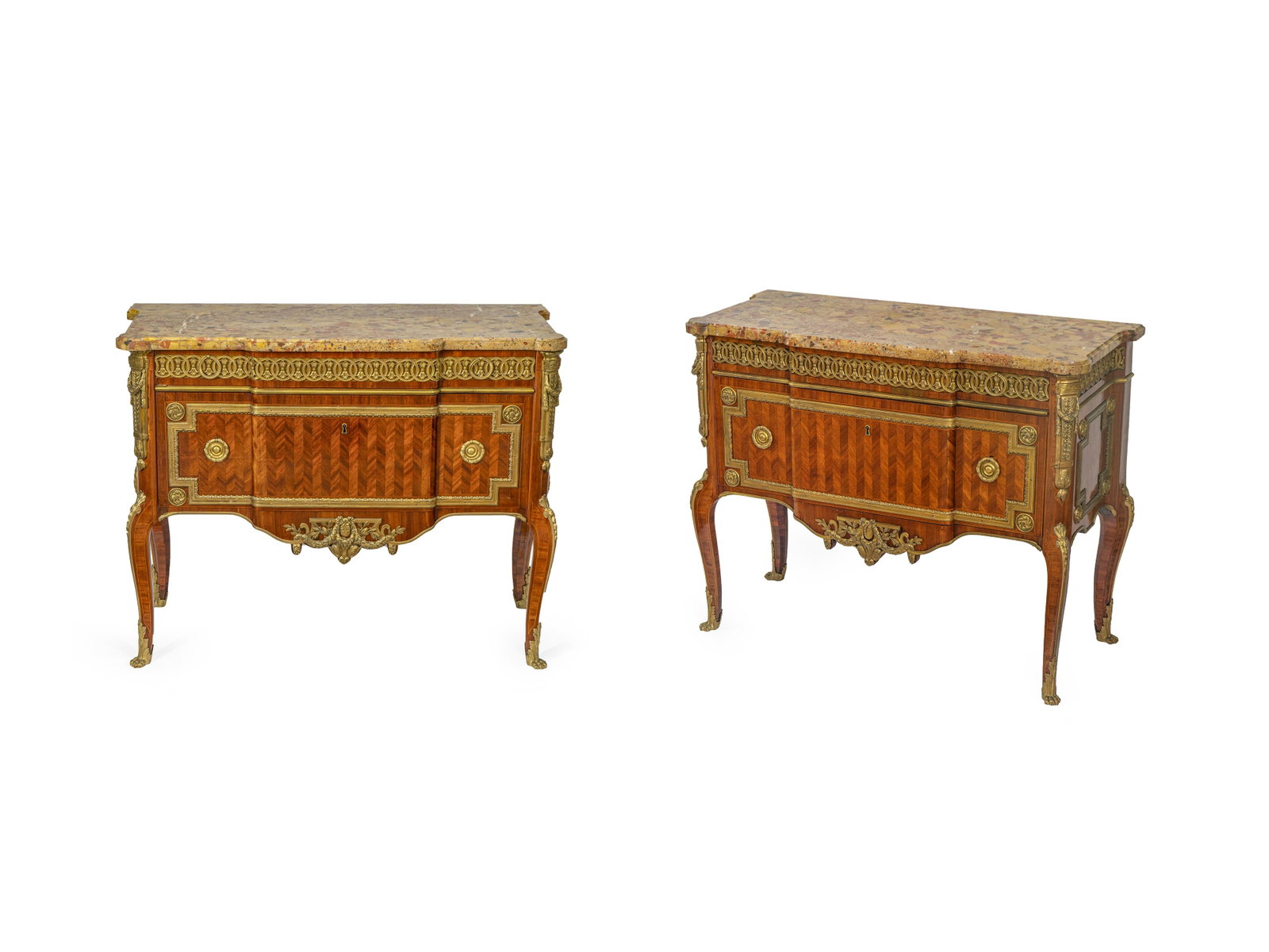 A Pair of Transitional Style Gilt Bronze Mounted: A Pair of Transitional Style Gilt Bronze Mounted Parquetry Commodes 20TH CENTURY each having a rectangular breche d'alep marble top with eared corners, the cases raised on cabriole legs ending in paw 