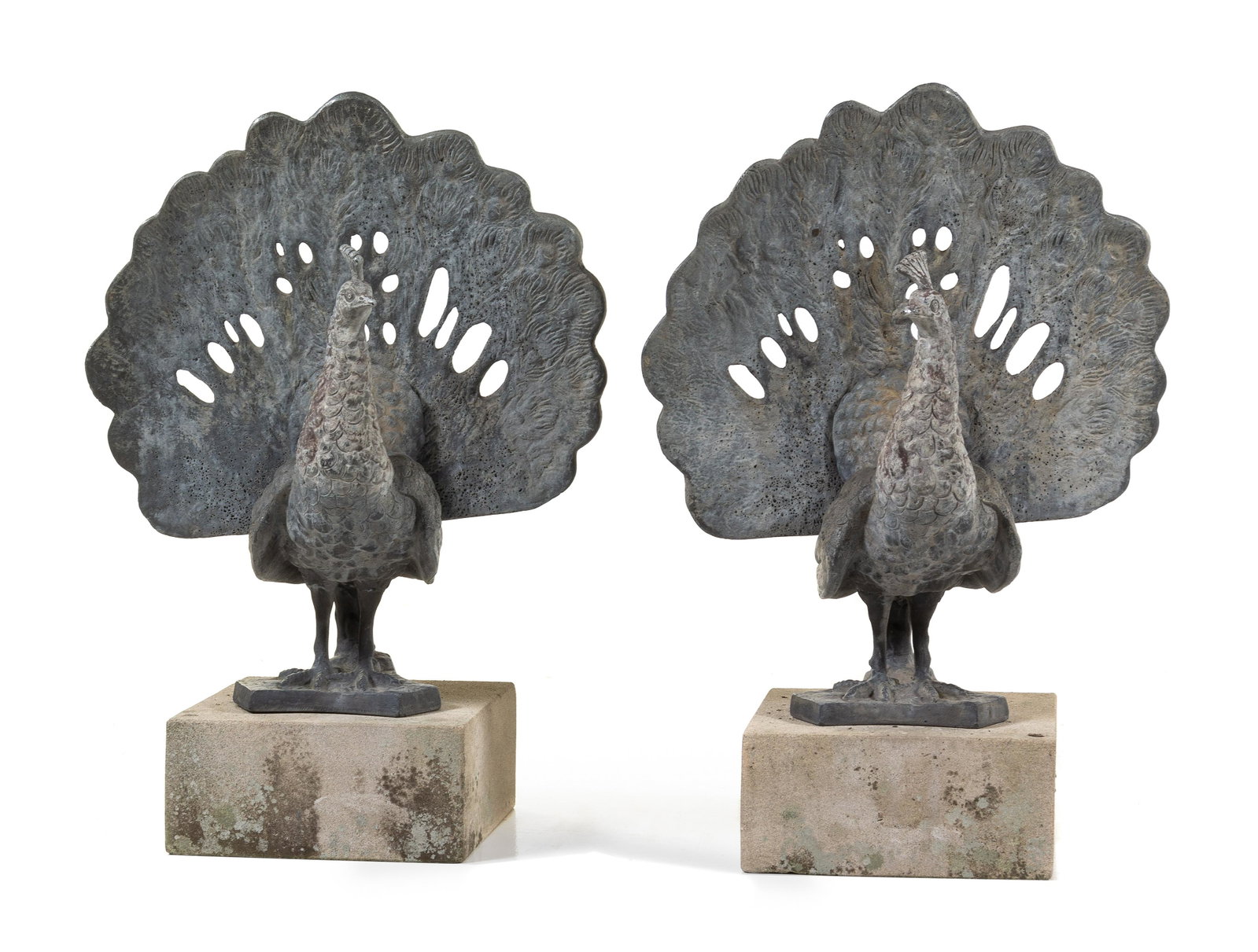 A Pair of Lead Figures of Peacocks Height overall 28: A Pair of Lead Figures of Peacocks LATE 19TH/EARLY 20TH CENTURY each in the form of a handsome peacock with displayed plumage, raised on a cement plinth. Height overall 28 1/2 inches.