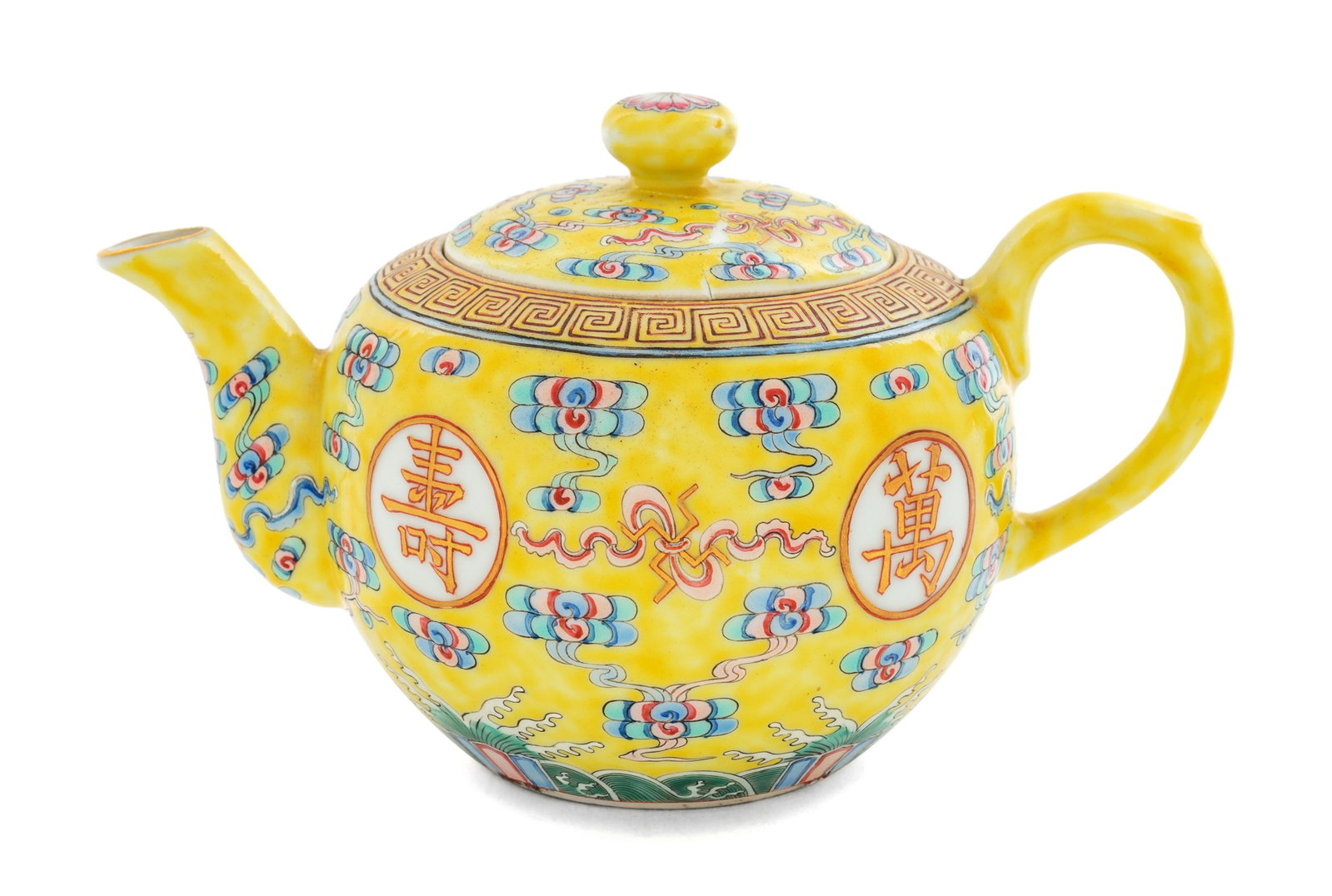 A Chinese Famille Jaune Porcelain Covered Teapot : A Chinese Famille Jaune Porcelain Covered Teapot GUANGXU PERIOD (1875-1908) of globular form, the exterior decorated with characters reading wan shou wu jiang (boundless longevity), amongst clusters