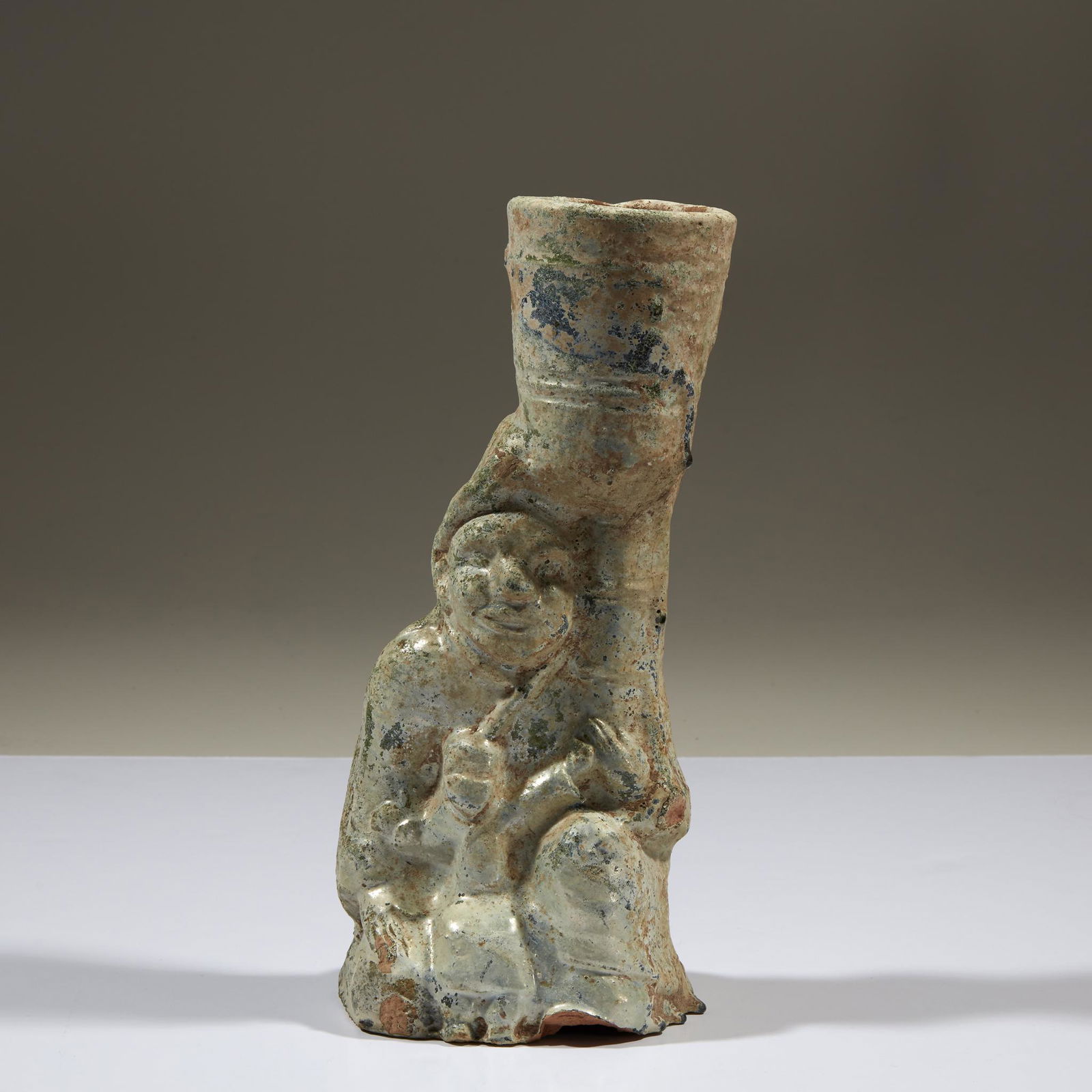 A Chinese green-glazed figural lamp, probably Han (1 of 1)