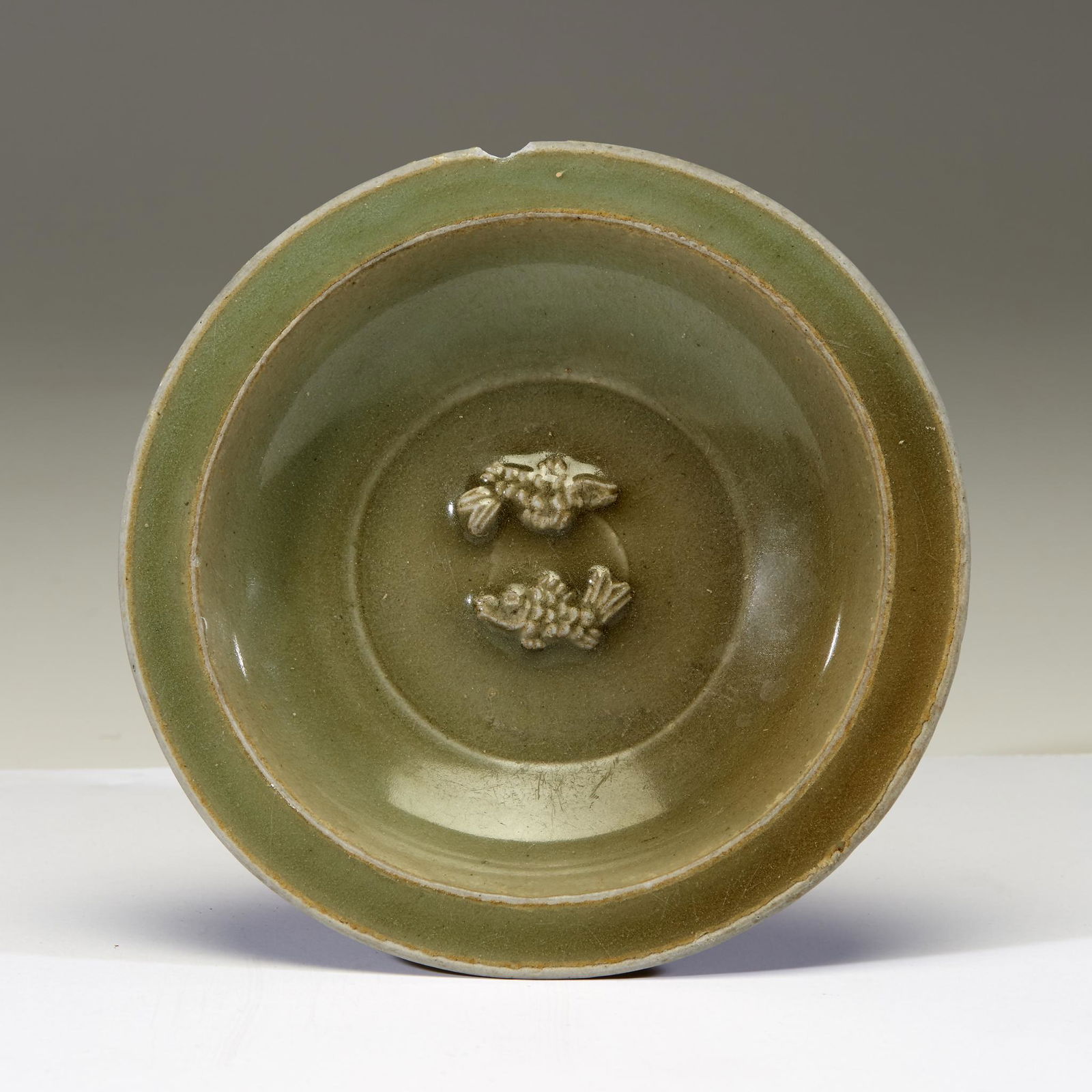 A Chinese Longquan celadon "Twin Fish" small dish, (1 of 2)