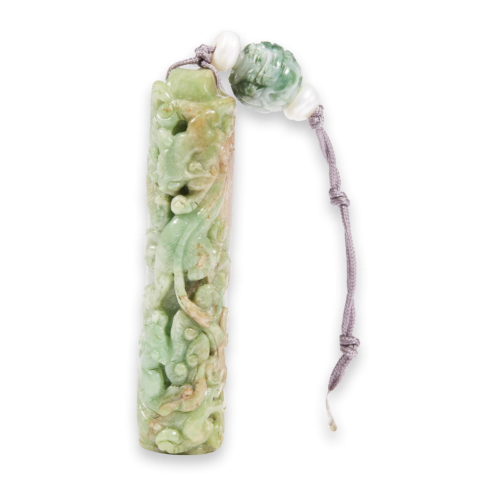 A Chinese carved green and pale brown jadeite "Qilong" (1 of 2)