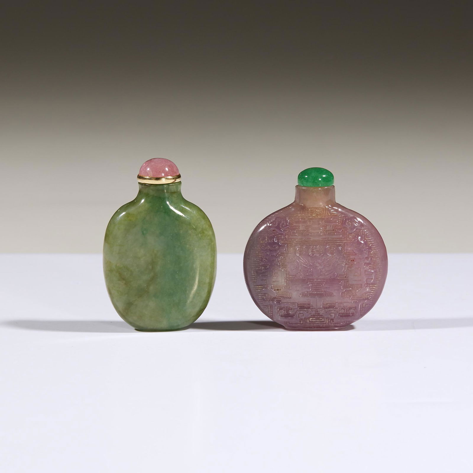 Two Chinese carved jadeite snuff bottles, (1 of 2)