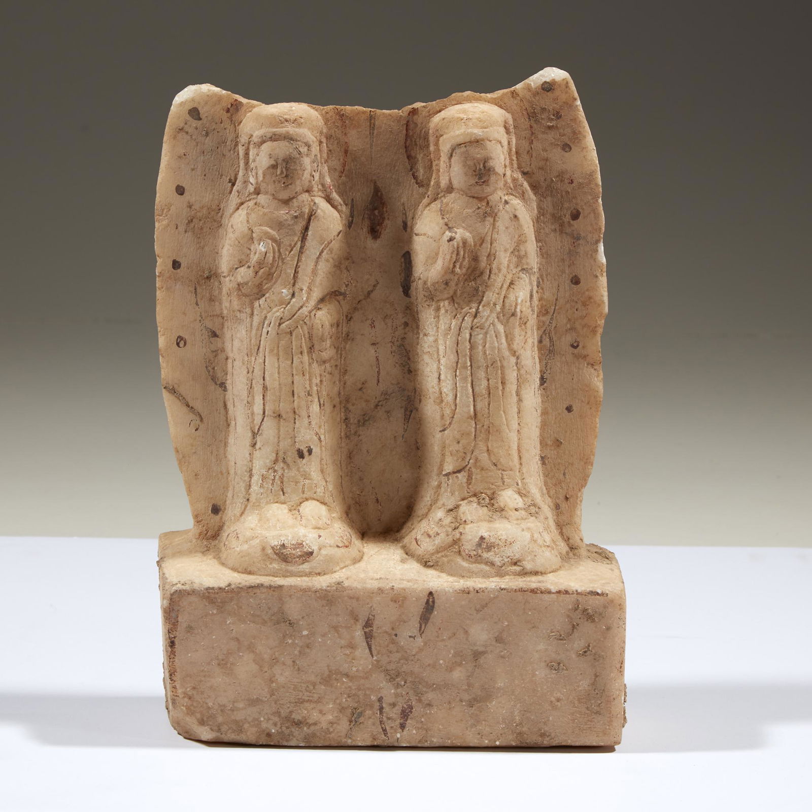 A Chinese carved white marble stele depicting two (1 of 2)