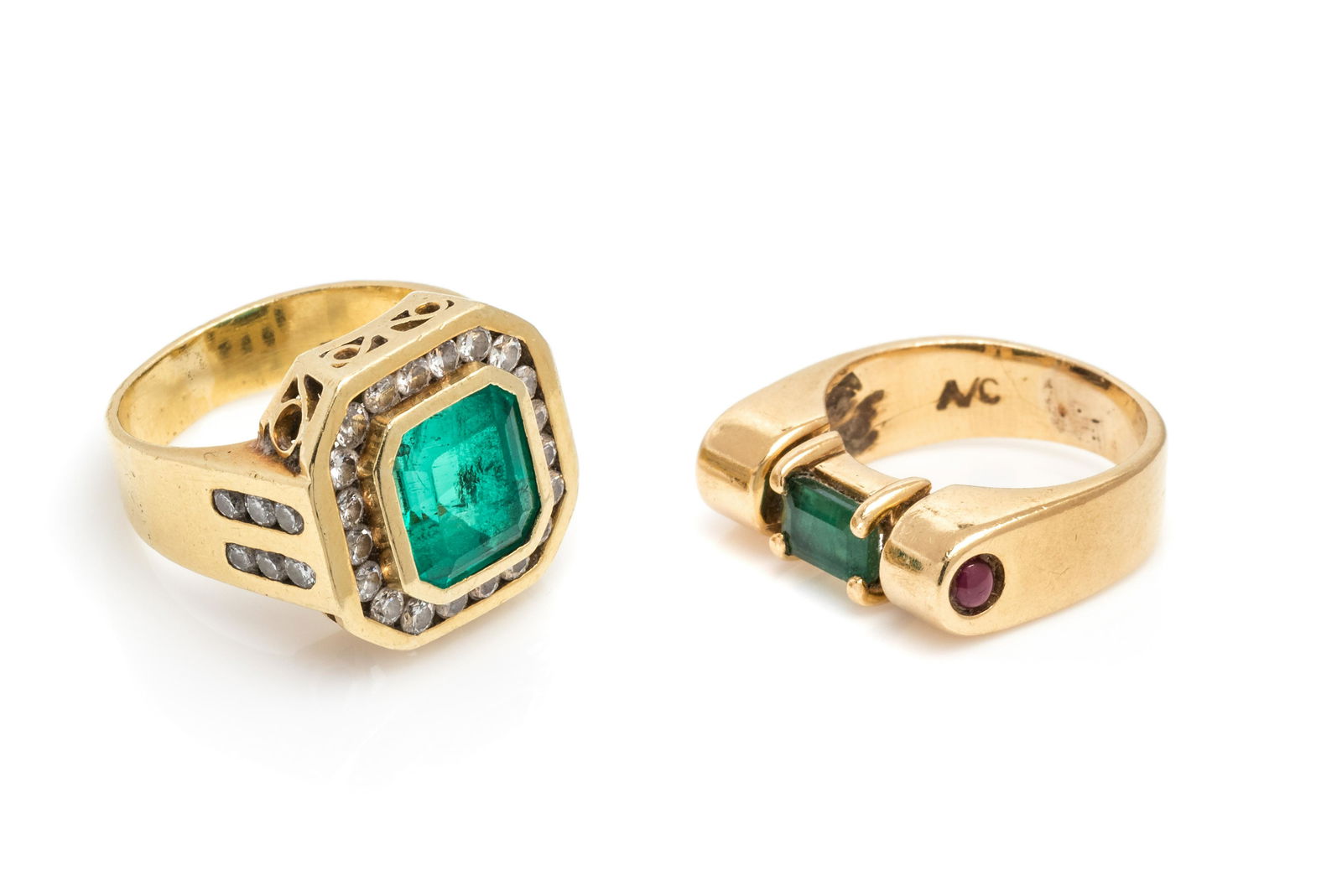 COLLECTION OF YELLOW GOLD AND EMERALD RINGS: COLLECTION OF YELLOW GOLD AND EMERALD RINGS Consisting of a ring containing one emerald cut emerald measuring approximately 9.00 x 8.30 x 6.50 mm and 32 round brilliant cut diamonds weighing approxima