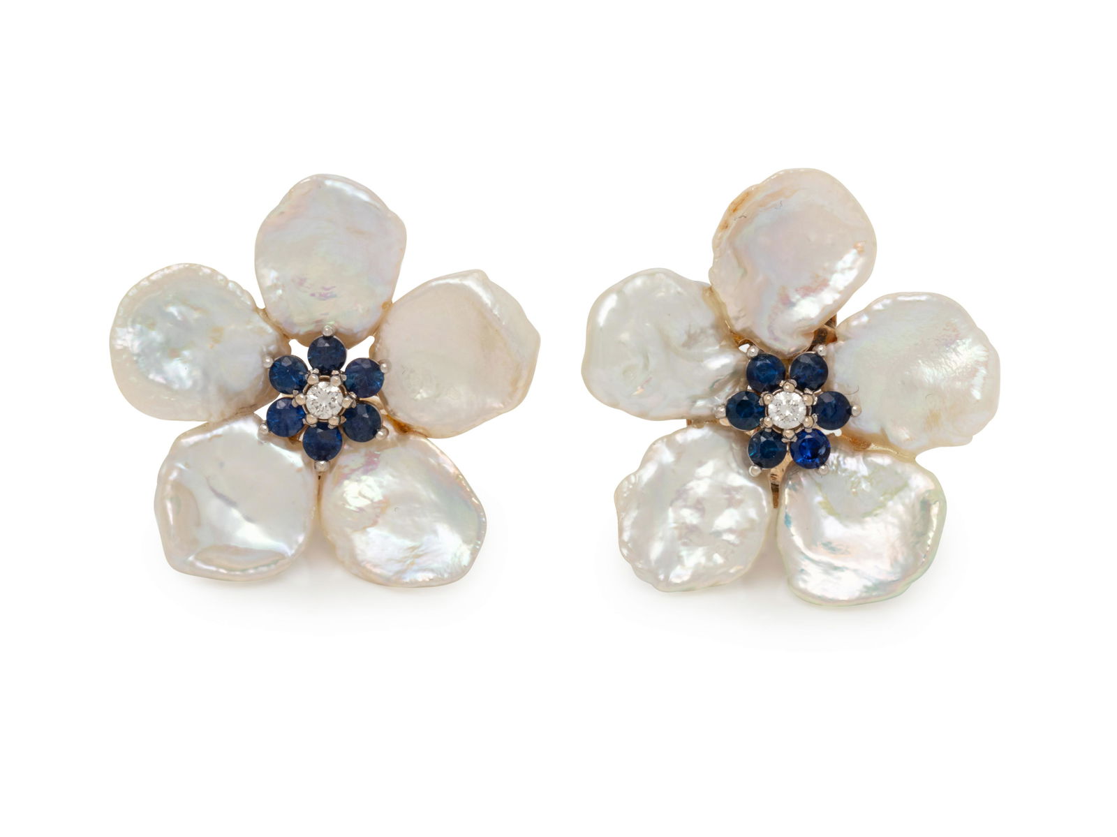 MAZ, CULTURED FRESHWATER PEARL, SAPPHIRE AND DIAMOND: MAZ, CULTURED FRESHWATER PEARL, SAPPHIRE AND DIAMOND FLOWER EARCLIPS Containing 10 freshwater pearls measuring approximately 12.00 x 12.00 mm, 12 round mixed cut sapphires and two round brilliant cut
