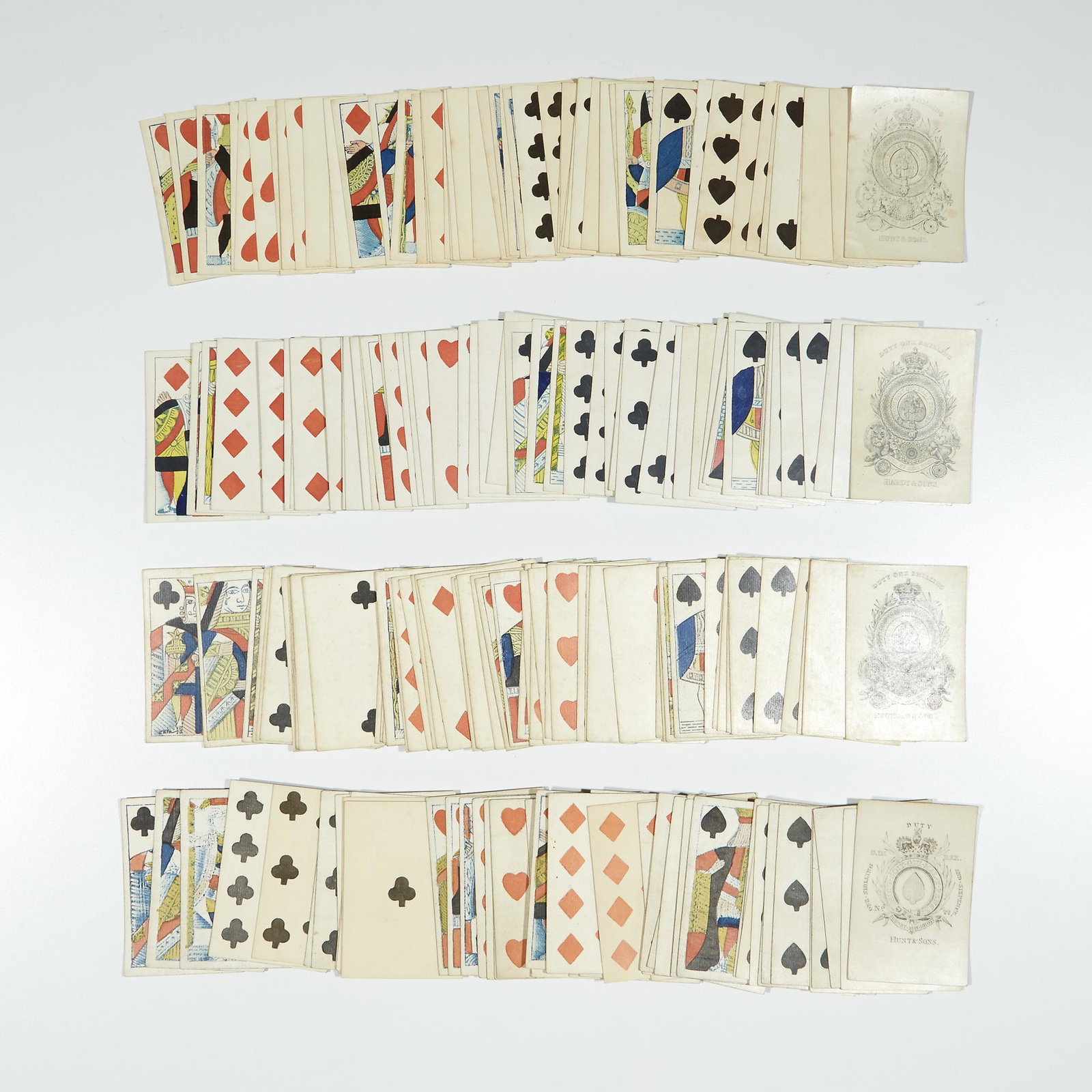 [Playing Cards], Four English 19th Century Standard: [Playing Cards] Four English 19th Century Standard Playing Cards Decks All with single figure court cards, square borders & square corners: Hunt & Sons, ca. 1810-1820, block & stencil, 93x63mm., plain