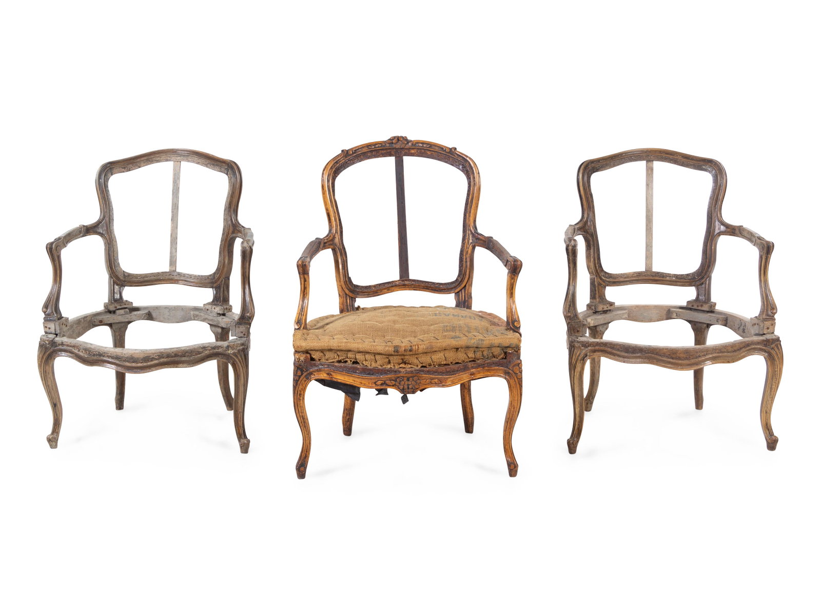 A Pair of Louis XV Fauteuils and an Associated Fauteuil: A Pair of Louis XV Fauteuils and an Associated Fauteuil 18th Century Height 34 inches. Property from Christa's Ltd., Chicago, Illinois