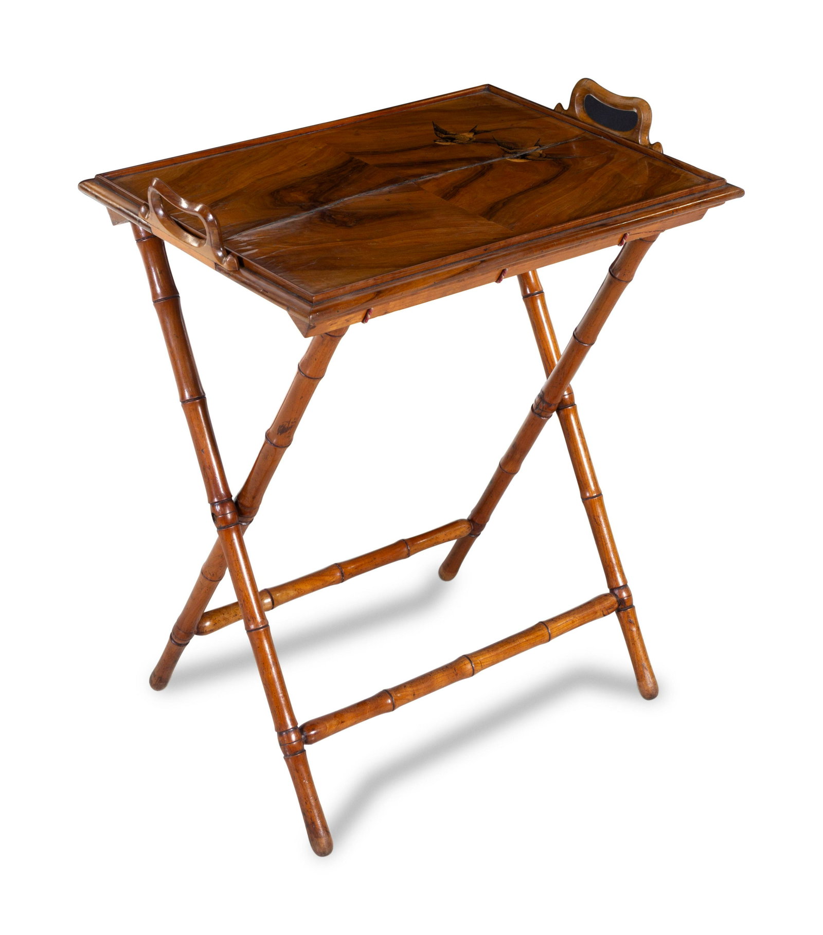 A Continental Mahogany Tray Table: A Continental Mahogany Tray Table Late 19th/Early 20th Century Width of tray 24 inches. Property from Christa's Ltd., Chicago, Illinois