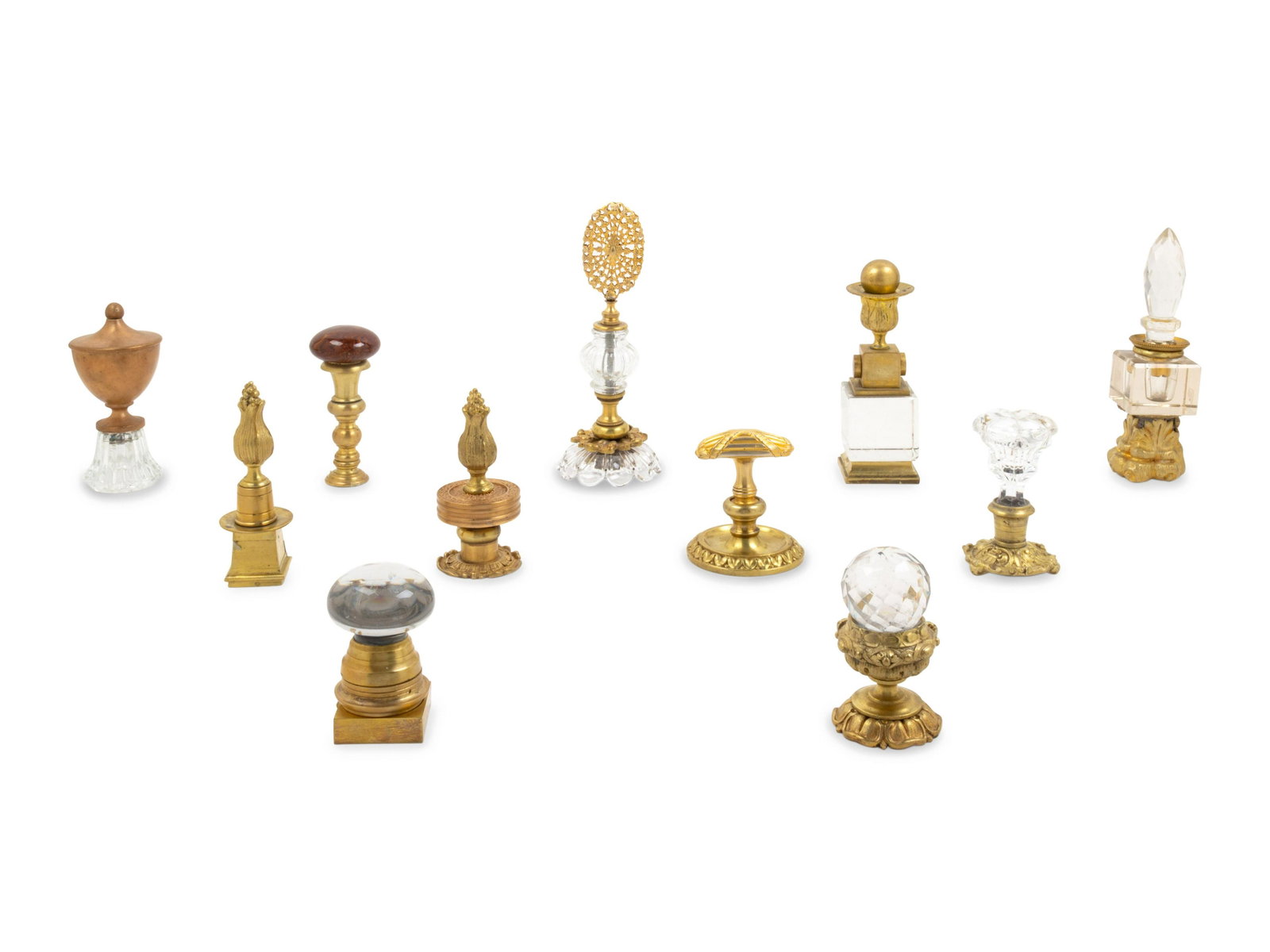 Eleven Bronze, Brass and Glass Table Ornaments: Eleven Bronze, Brass and Glass Table Ornaments 19th and 20th Century Height of tallest 9 inches. Property from Christa's Ltd., Chicago, Illinois