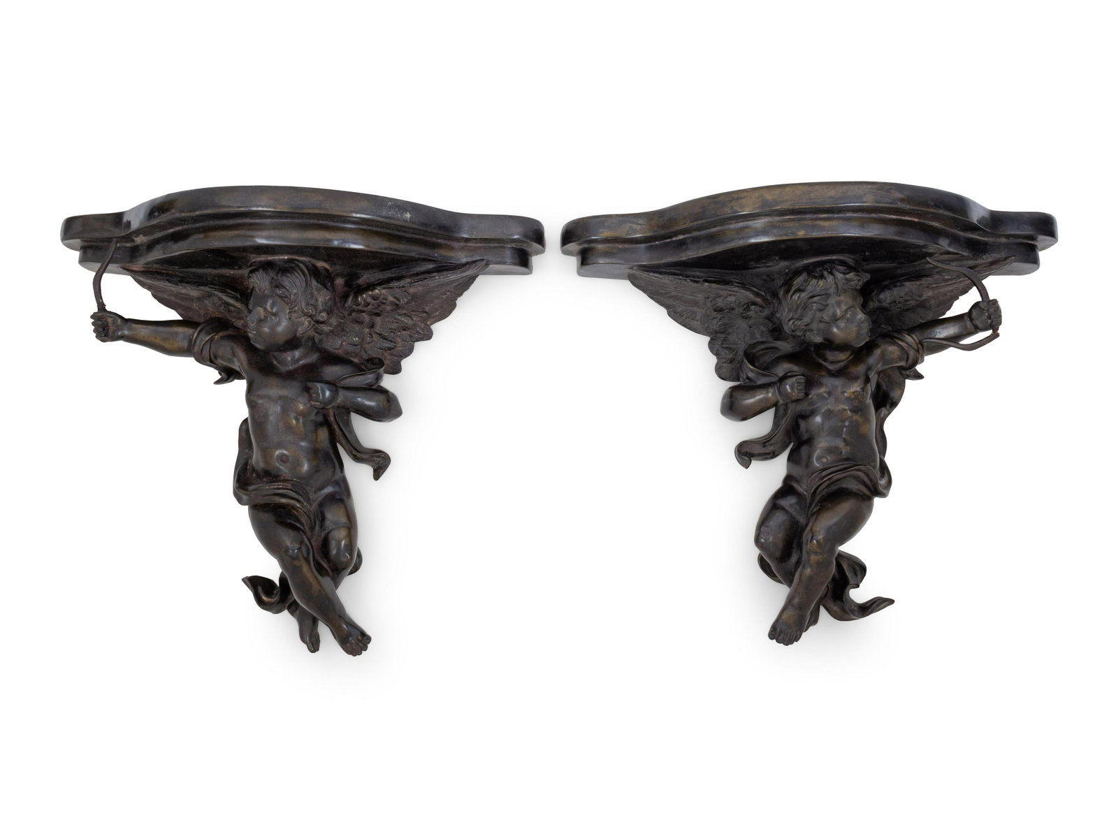 A Pair of Carved Wood Brackets: A Pair of Carved Wood Brackets Late 19th/Early 20th Century each in the form of a putto. Height 17 1/4 inches. Property from Christa's Ltd., Chicago, Illinois