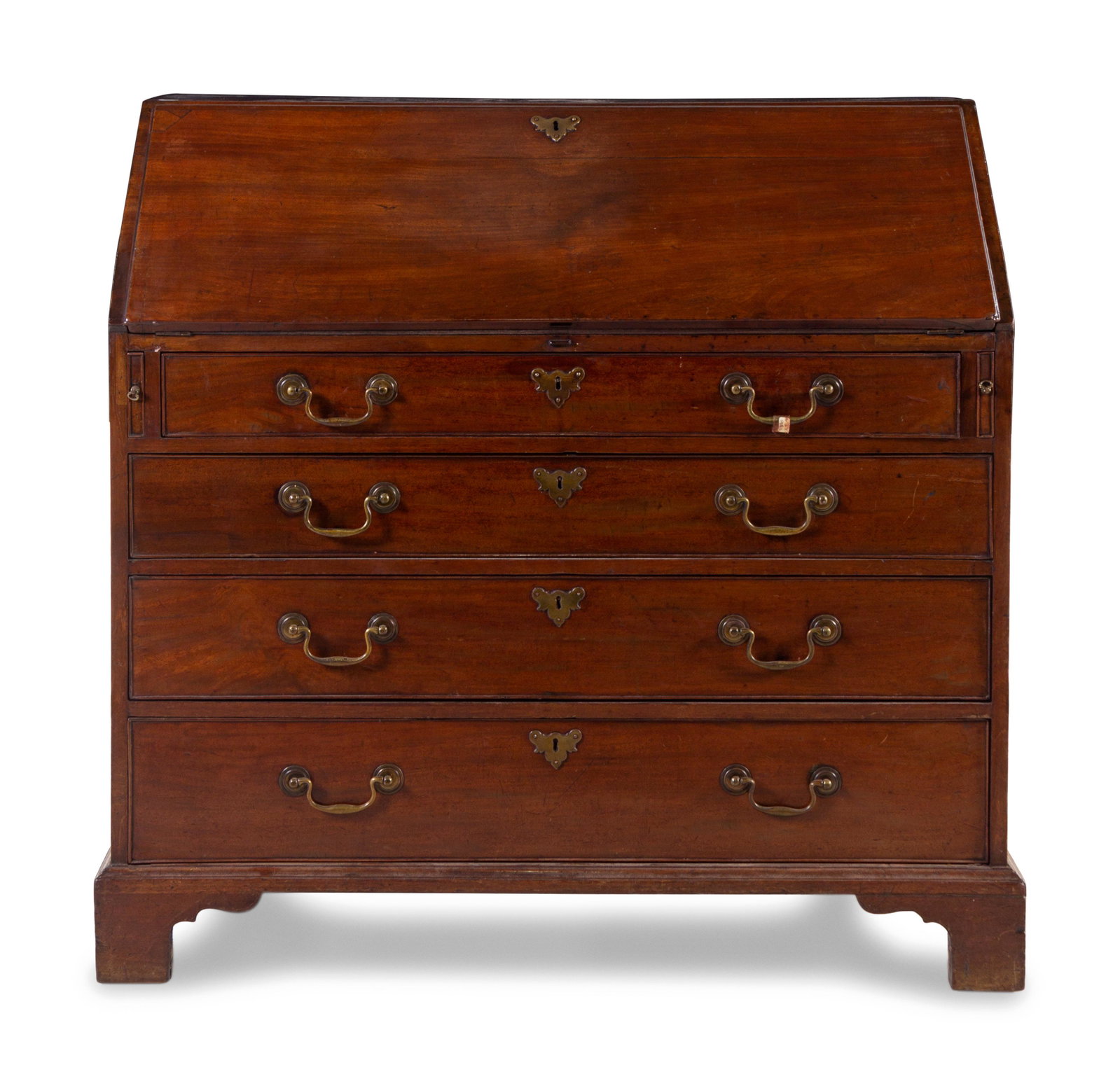 A George III Slant-Front Desk: A George III Slant-Front Desk 18th/19th Century the fall-front opening to a fitted interior above four graduated drawers. Height 41 x width 41 3/4 x depth 22 inches. Property from Christa's Ltd., Chic