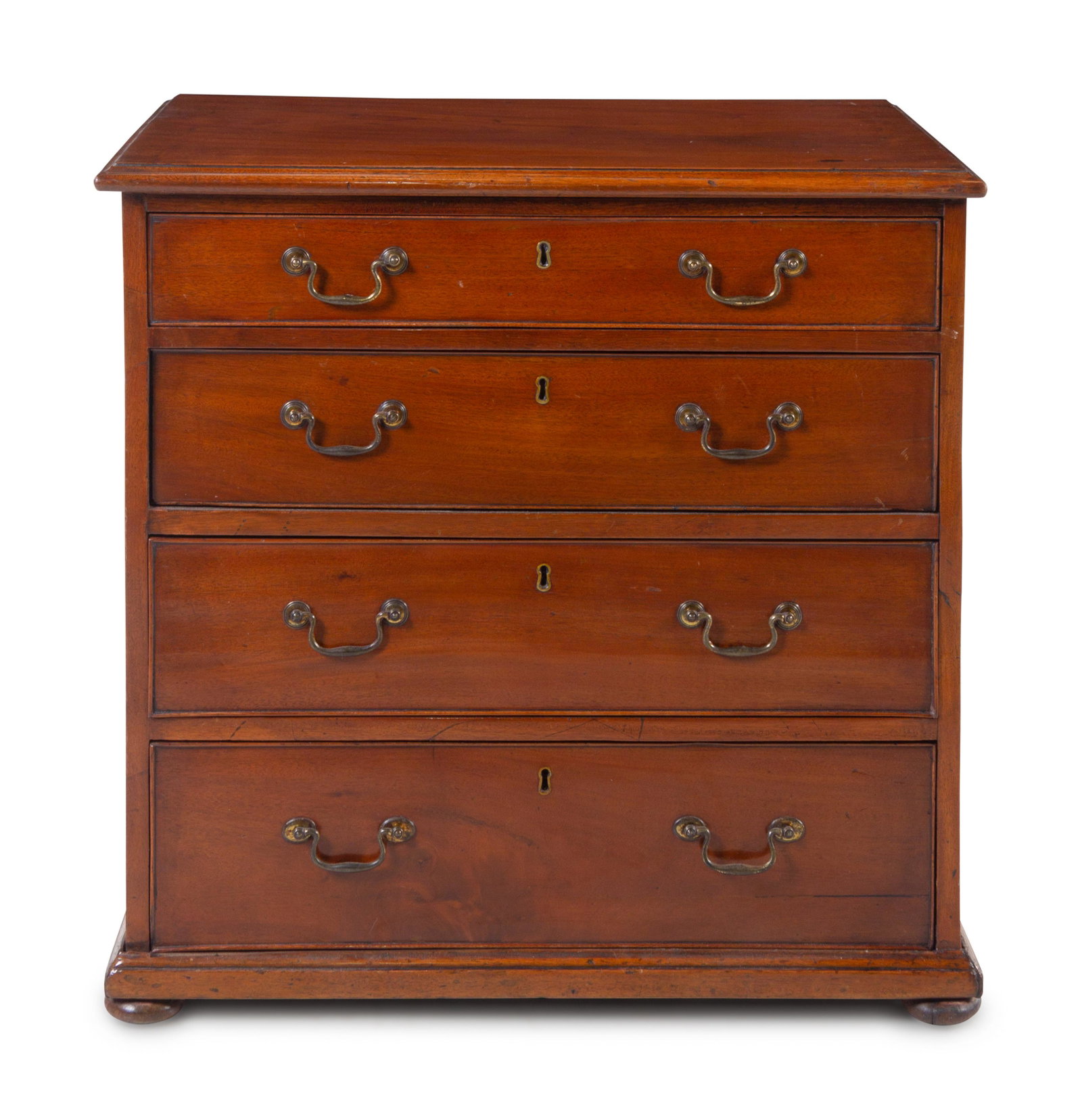A George III Style Mahogany Bachelor's Chest: A George III Style Mahogany Bachelor's Chest 19th Century Height 26 x width 26 1/2 x depth 16 1/2 inches. Property from Christa's Ltd., Chicago, Illinois
