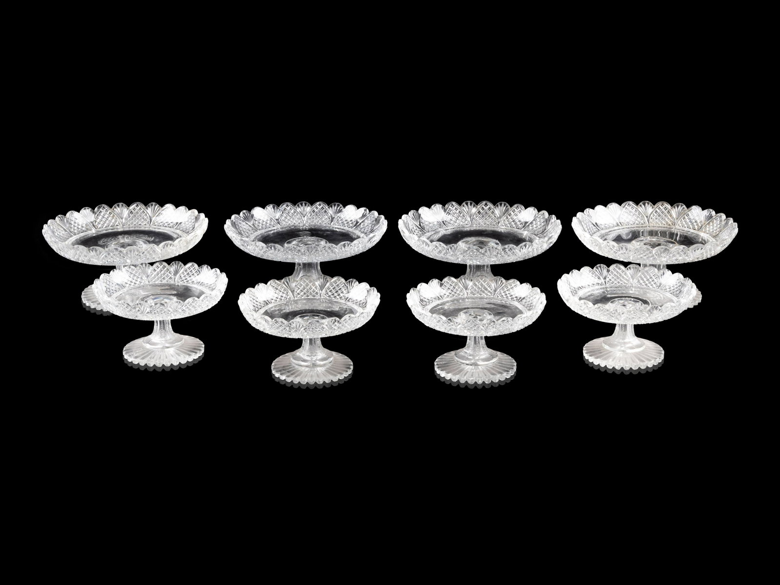 Eight Cut-Glass Cake Stands: Eight Cut-Glass Cake Stands Late 19th/Early 20th Century comprising four large and four small examples. Height of largest 3 3/4 x diameter 8 inches. Property from Christa's Ltd., Chicago, Illinois