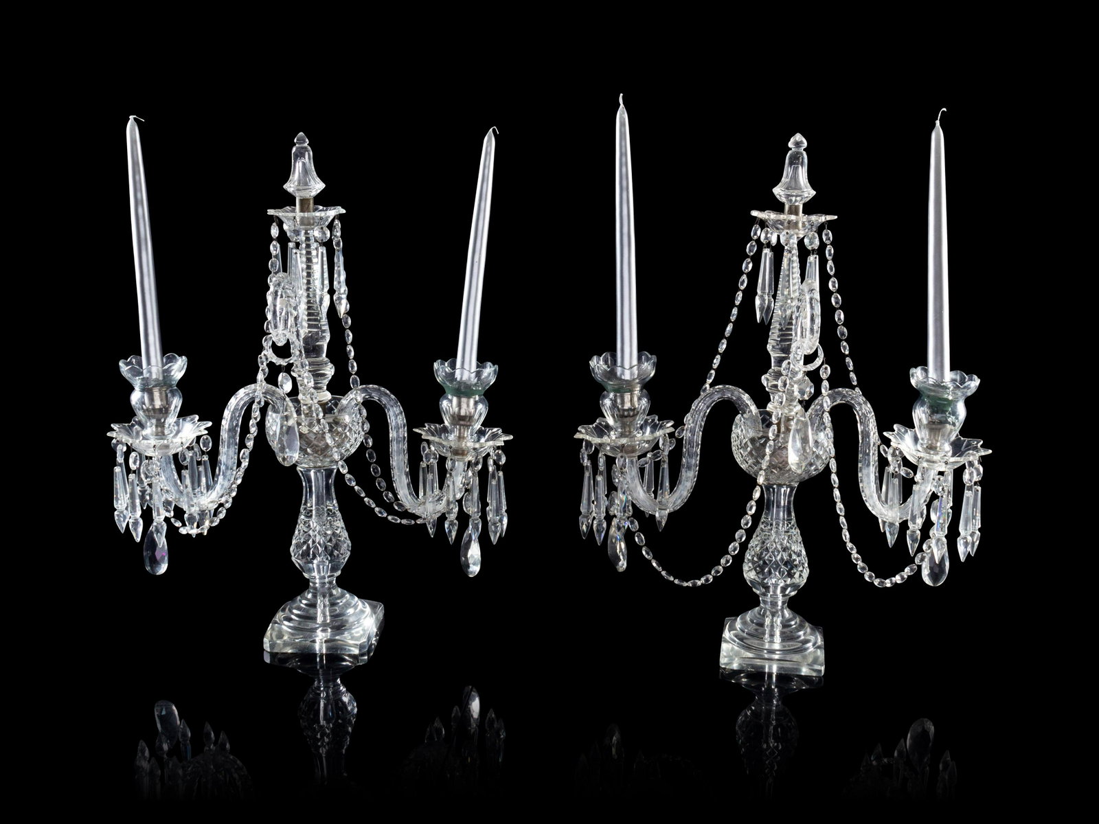 A Pair of Edwardian Cut-Glass Two-Light Candelabra: A Pair of Edwardian Cut-Glass Two-Light Candelabra Height 21 1/2 inches Property from Christa's Ltd., Chicago, Illinois