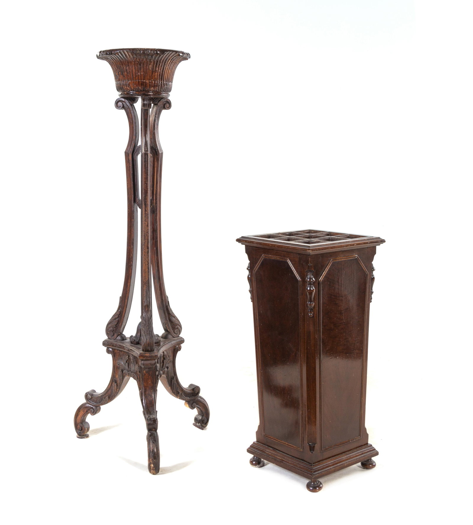 A George II Style Mahogany Jardiniere: A George II Style Mahogany Jardiniere Early 20th Century together with a mahogany umbrella stand. Height of first 48 inches.