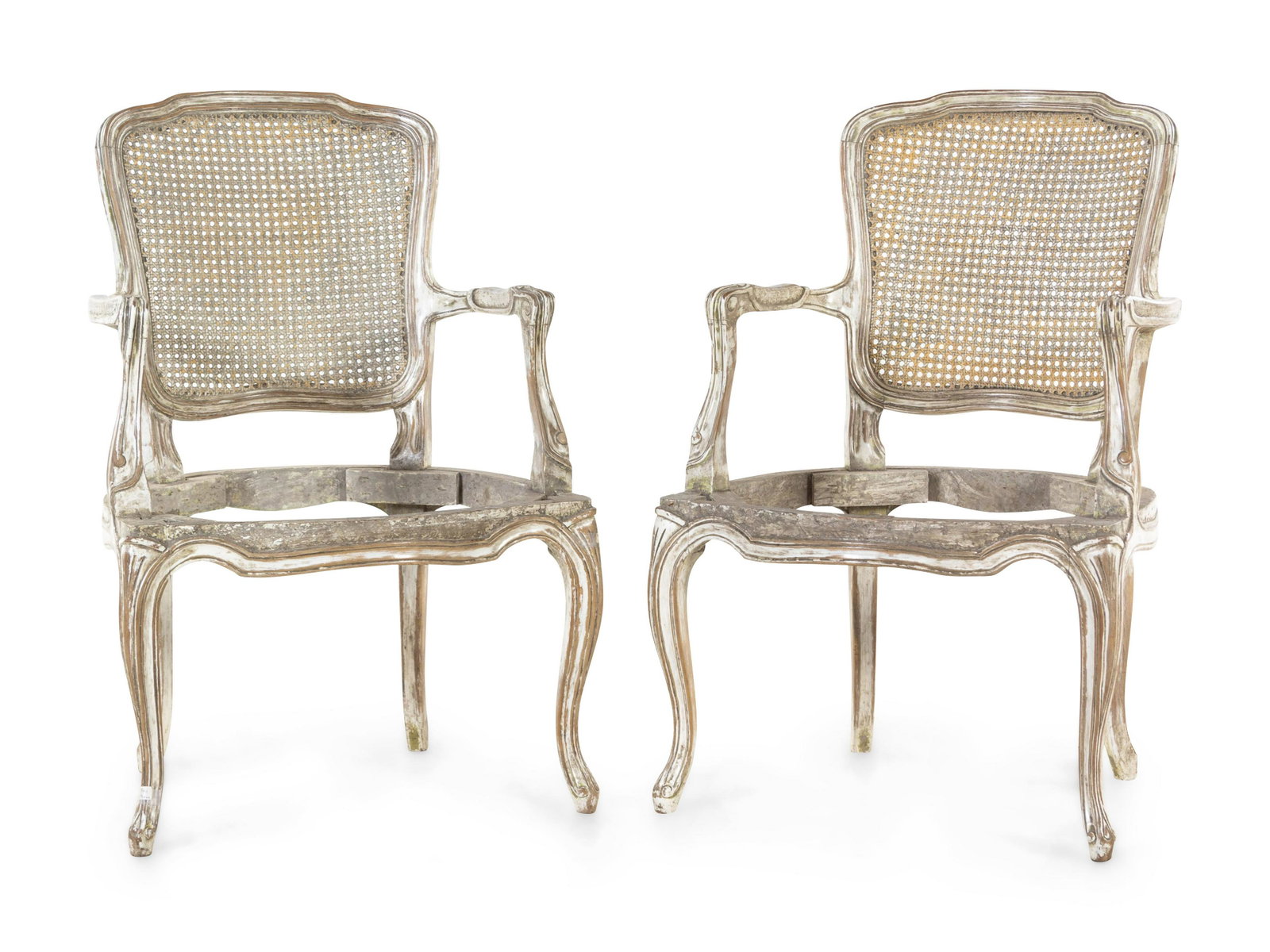 A Pair of Louis XV Style Painted Fauteuils: A Pair of Louis XV Style Painted Fauteuils 19th Century each with caned back. Height 35 1/2 inches. Property from Christa's Ltd., Chicago, Illinois
