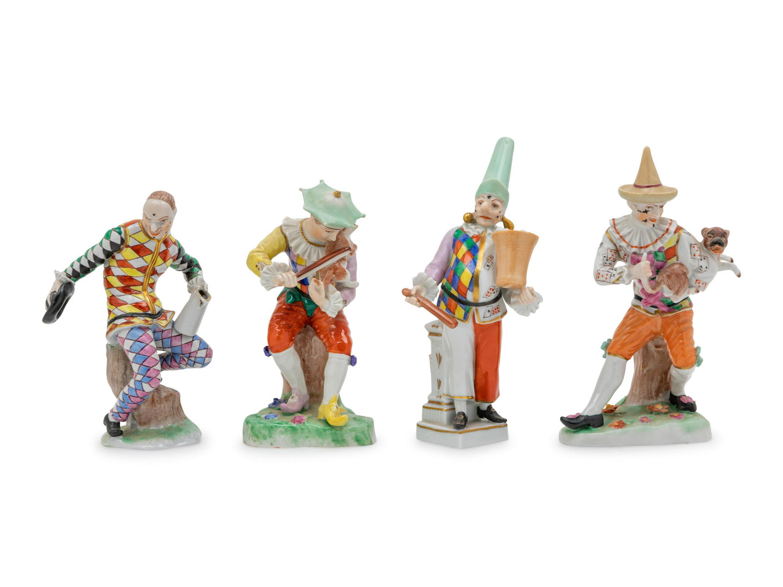 Four Continental Porcelain Harlequin Figures  (1 of 1)