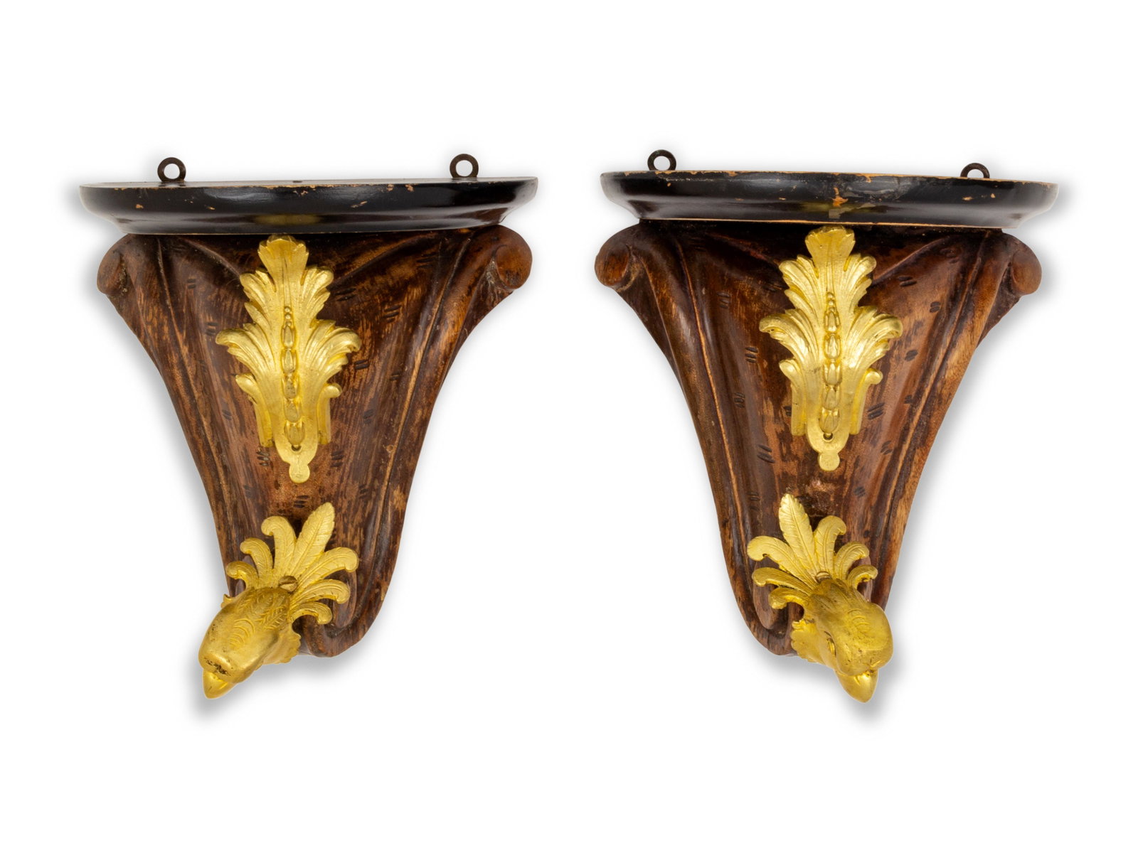 A Pair of Gilt Bronze Mounted Mahogany Wall Brackets: A Pair of Gilt Bronze Mounted Mahogany Wall Brackets 19th Century and Later Height 8 1/4 inches. Property from Christa's Ltd., Chicago, Illinois