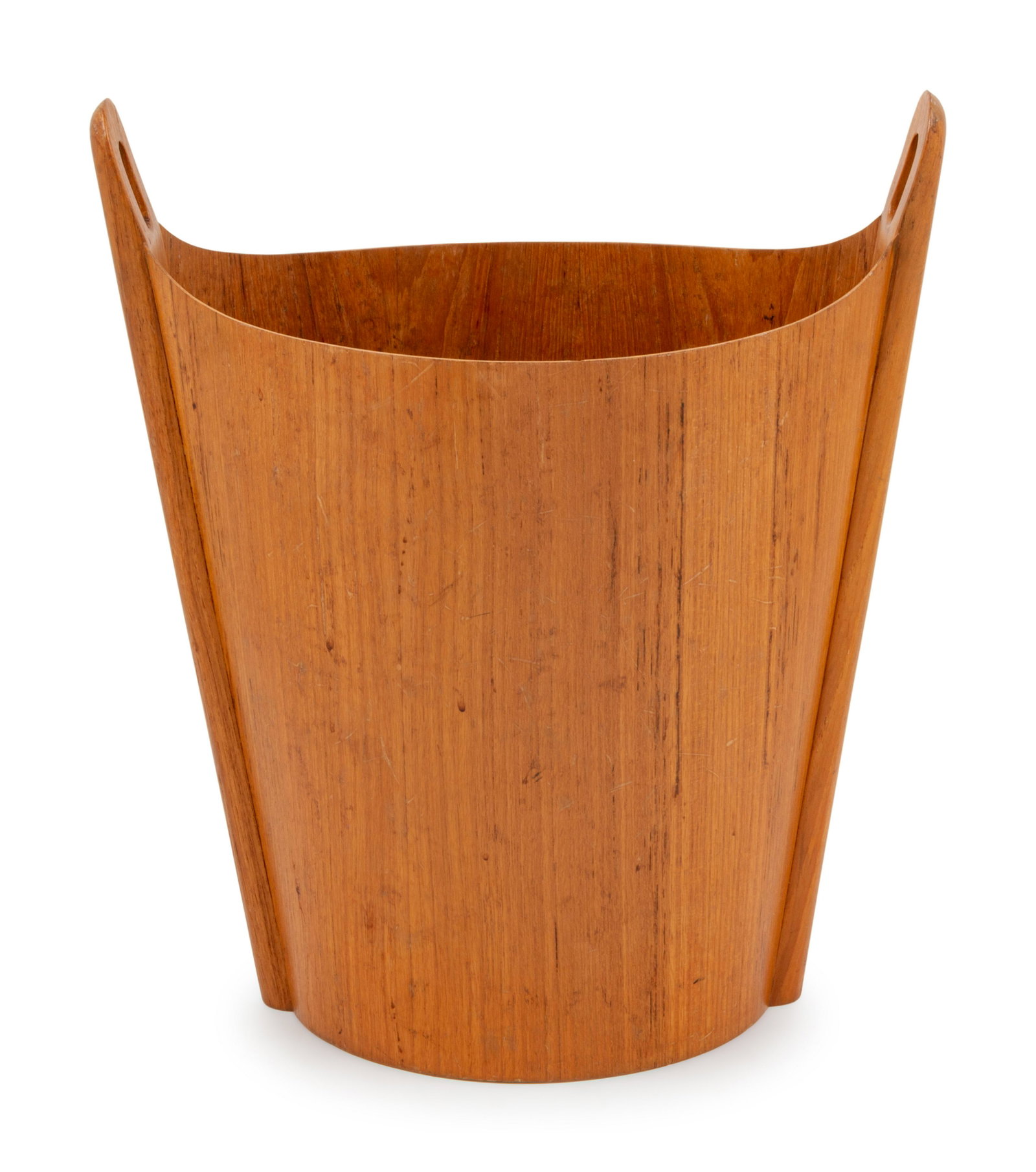 A Norwood Carved Teak Wastebasket Height 17 1/4 inches.: A Norwood Carved Teak Wastebasket 20th Century Height 17 1/4 inches. Property from The Estate of Stanley M. Freehling, Highland Park, Illinois