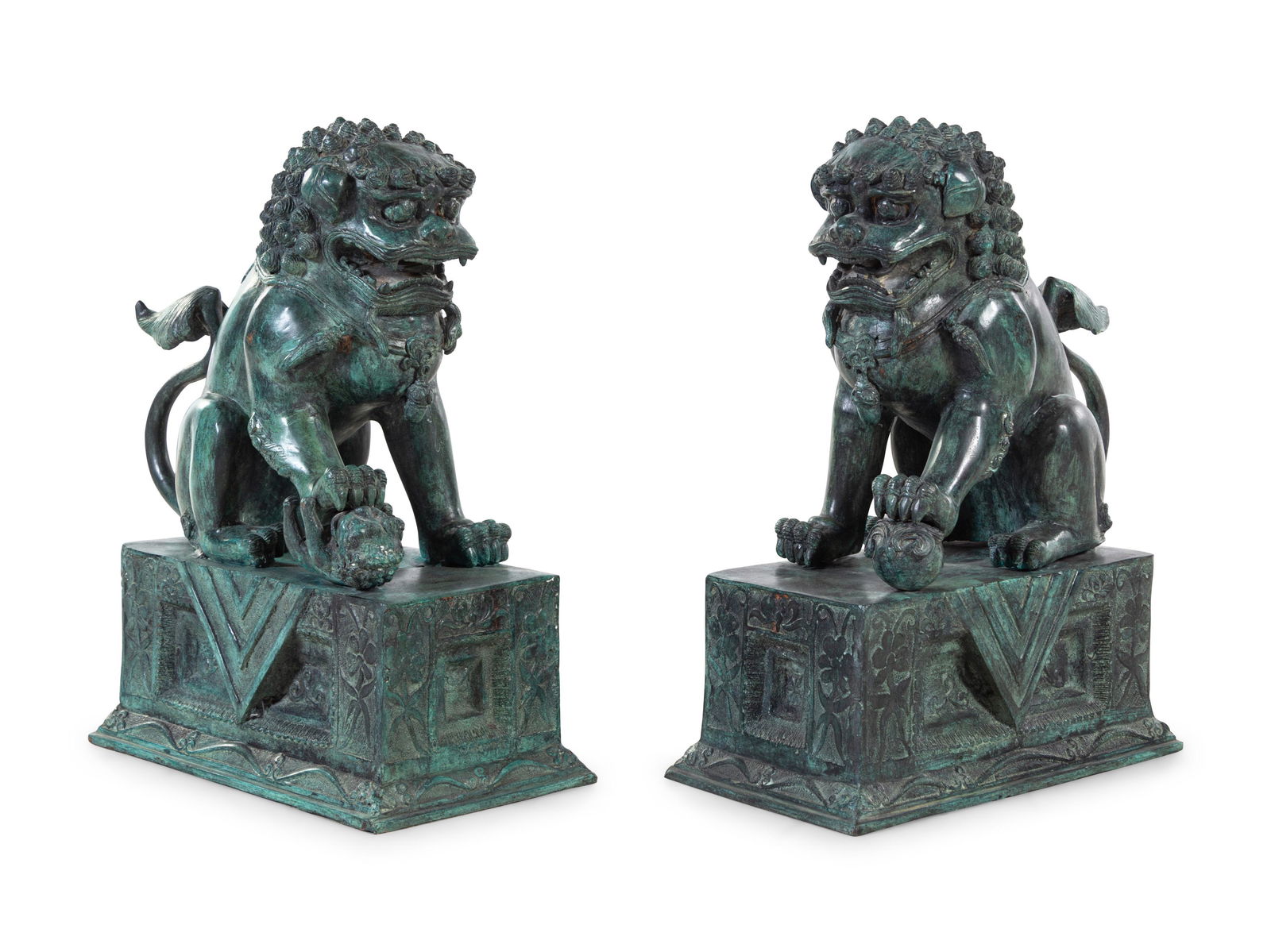 A Pair of Patinated Cast Metal Temple Guardians (1 of 2)