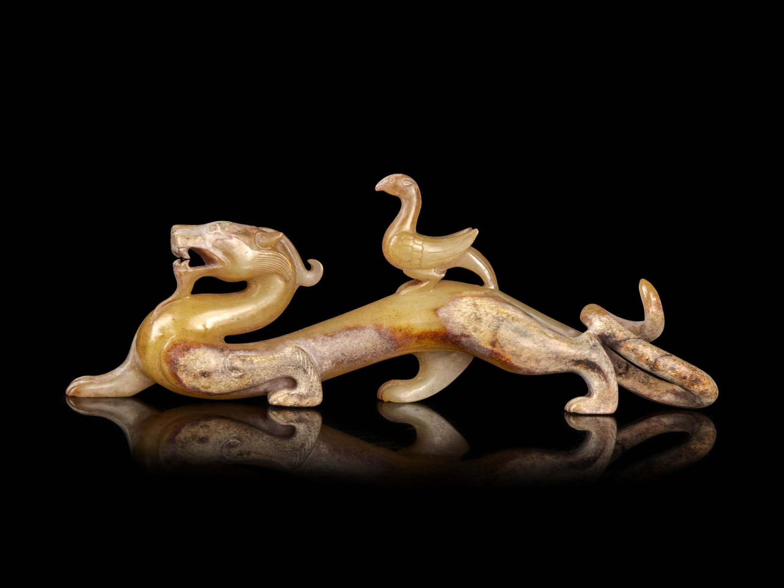 A Yellow Jade Dragon Length 6 1/8 in., 16 cm. (1 of 3)