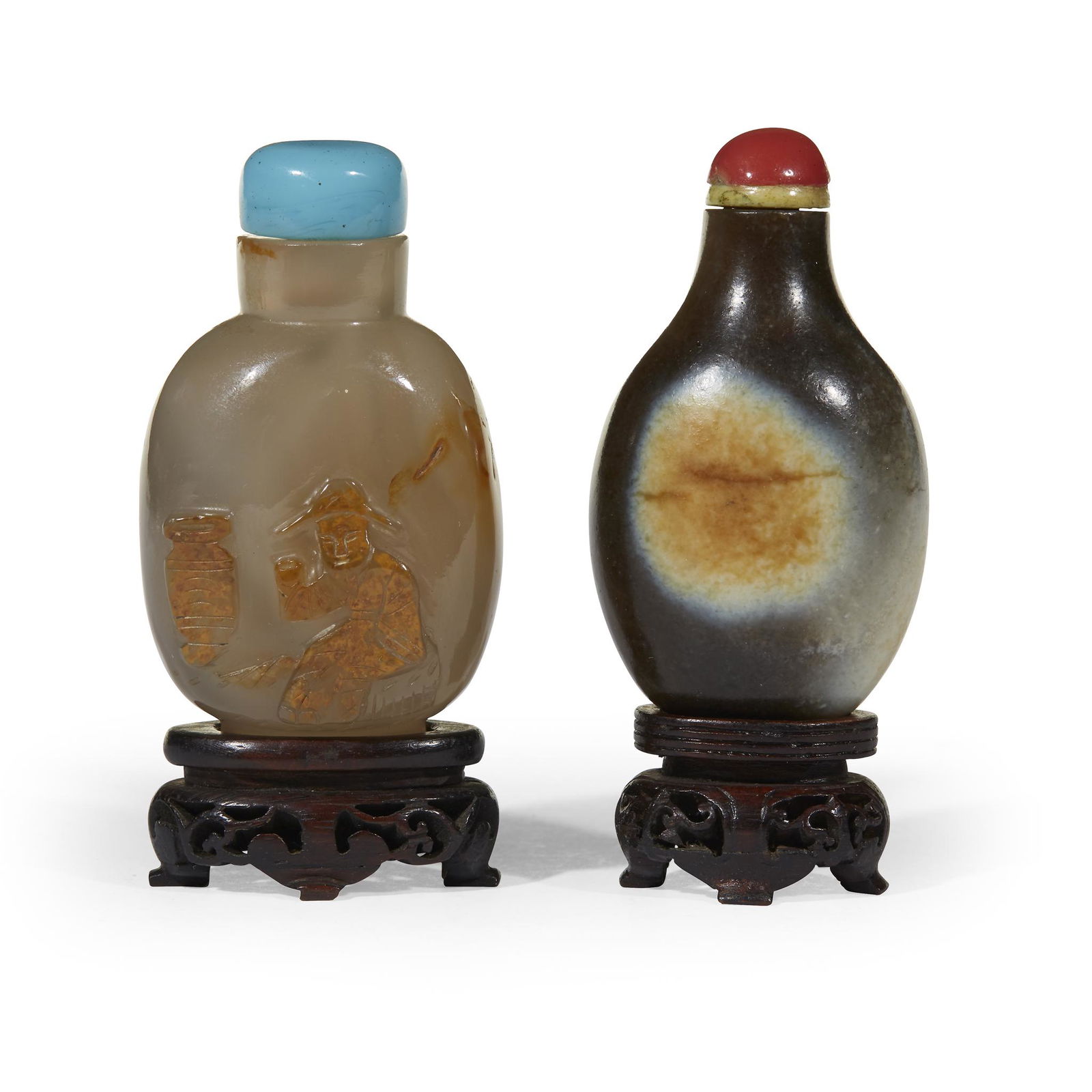 A Chinese carved agate snuff bottle and a grey and (1 of 2)