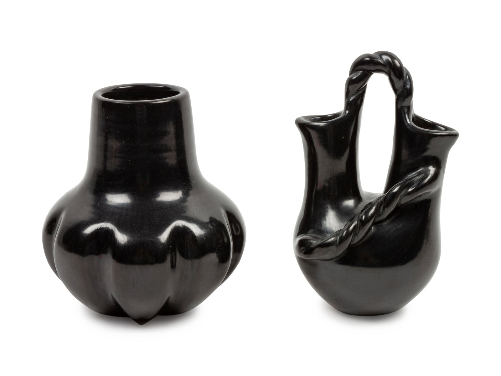 Cliff and Susan Roller (SANTA CLARA, B. 1961 / 20TH: Cliff and Susan Roller (SANTA CLARA, B. 1961 / 20TH CENTURY) Blackware Wedding Vases lot of 2, each signed and dated on base height 7 1/4 inches; and height 6 x diameter 5 1/2 inches Property from the