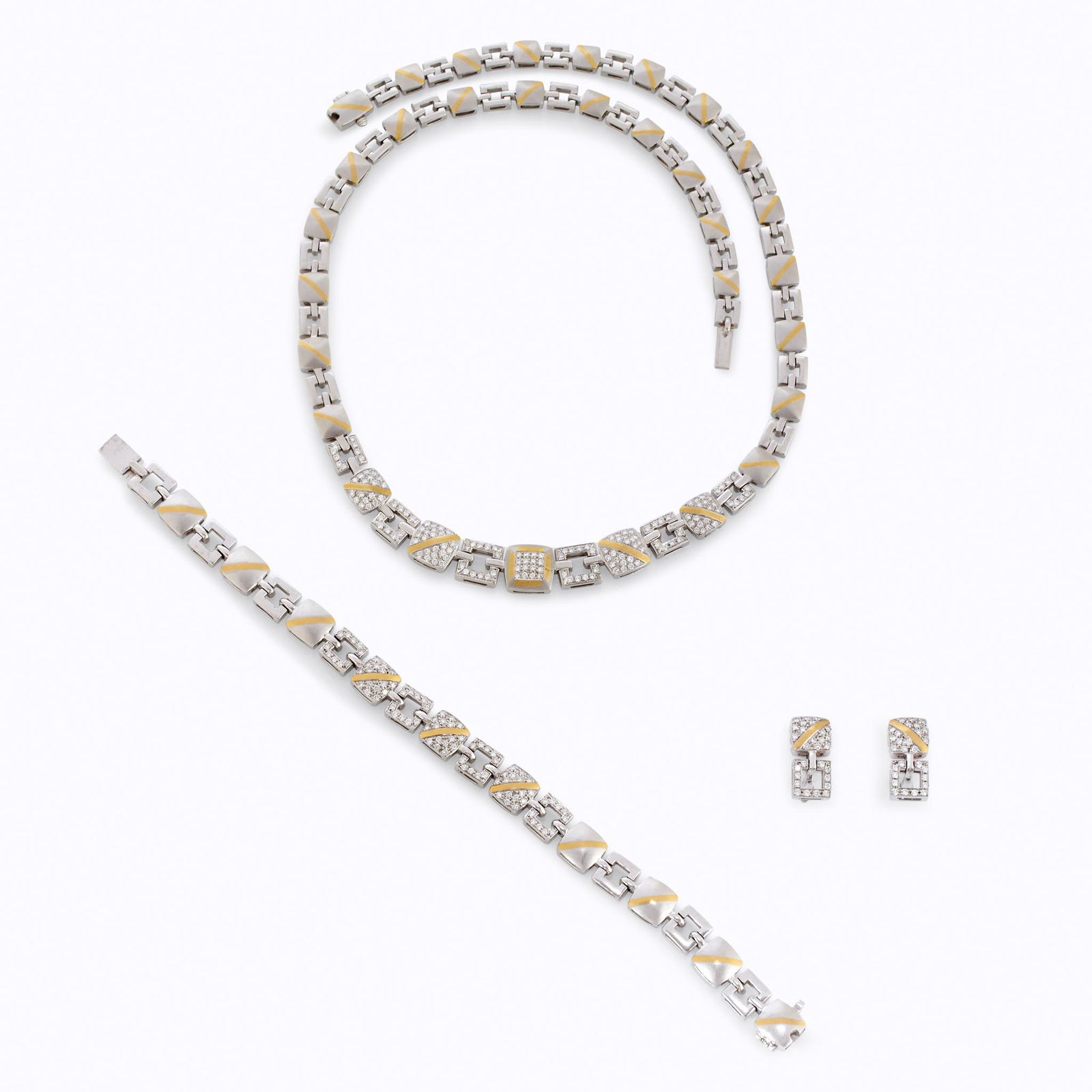 A platinum, eighteen karat gold, and diamond suite, (1 of 6)