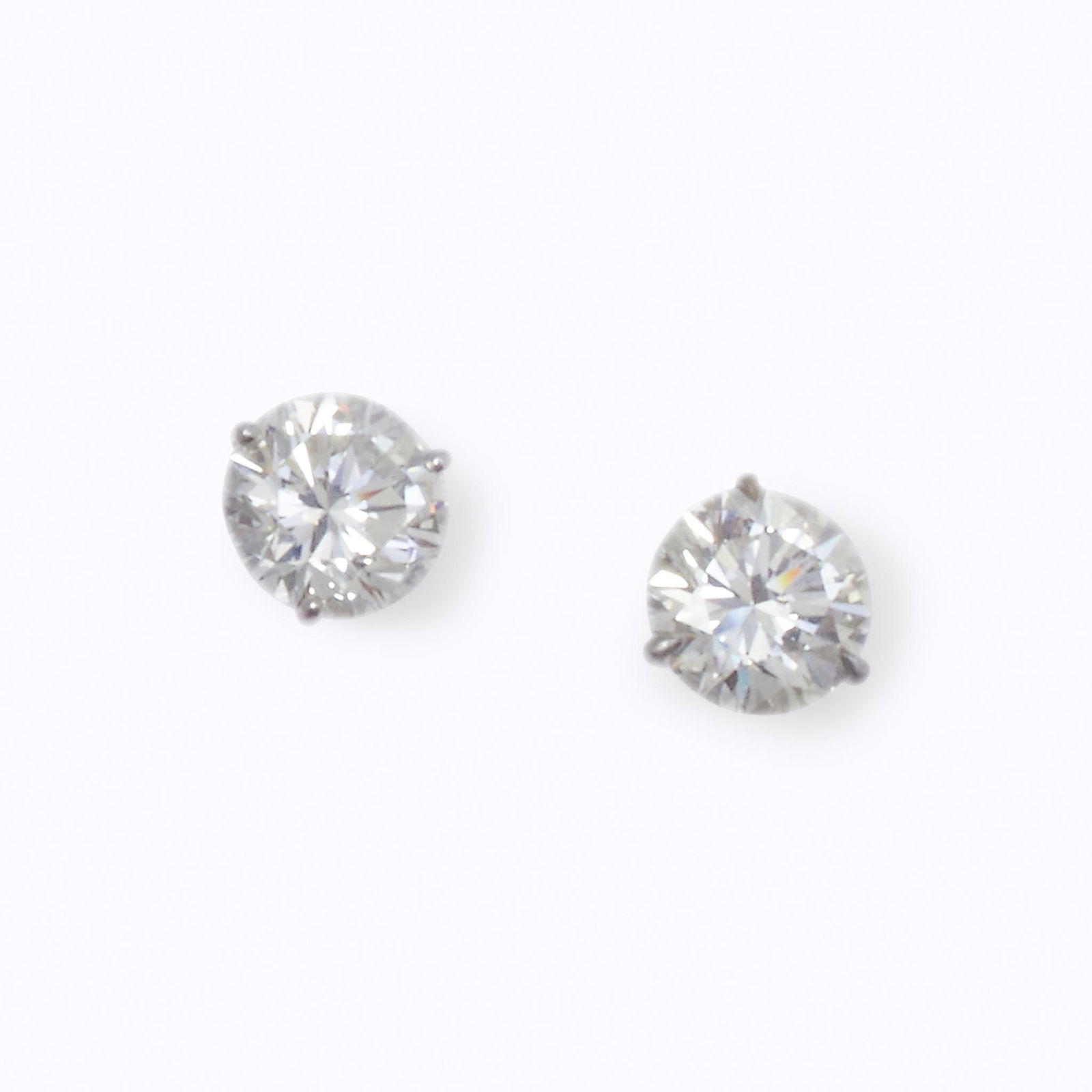 A pair of diamond earrings, (1 of 3)