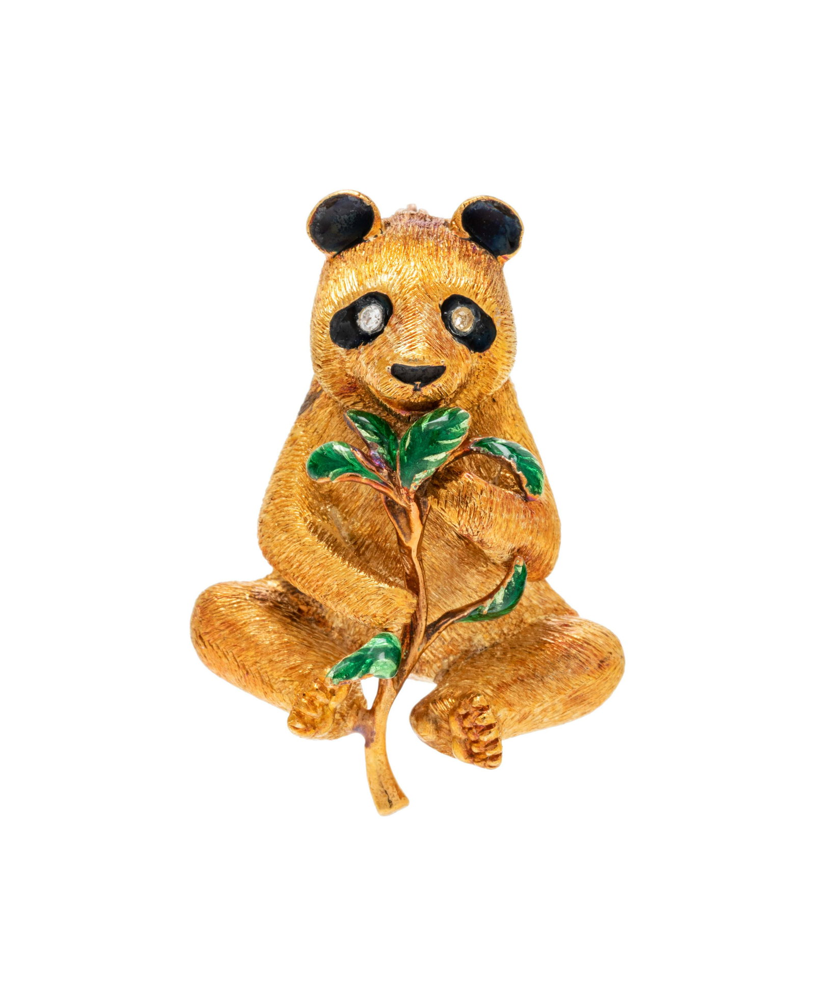 YELLOW GOLD, DIAMOND AND ENAMEL PANDA PENDANT/BROOCH: YELLOW GOLD, DIAMOND AND ENAMEL PANDA PENDANT/BROOCH Containing two single cut diamond eyes and black and green enamel detail. Stamp: 18K. 18.10 dwt.
