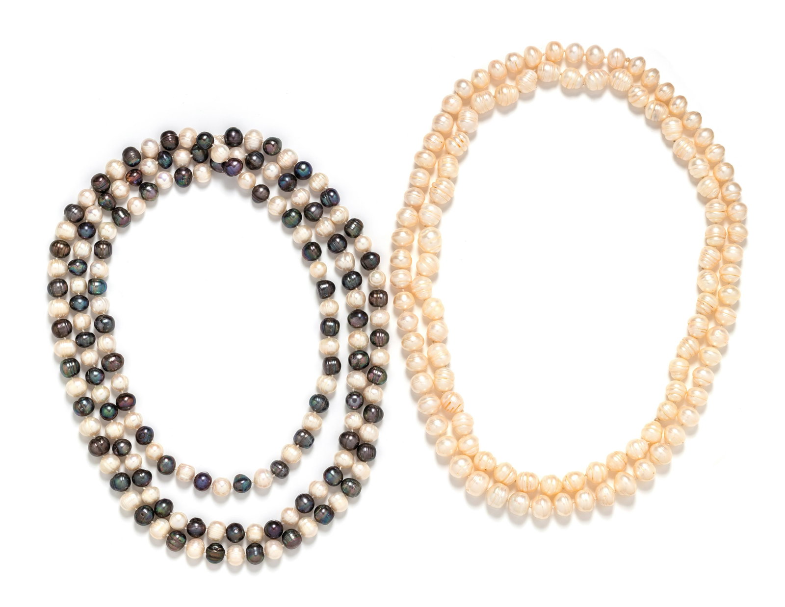 COLLECTION OF FRESHWATER BAROQUE PEARL NECKLACES: COLLECTION OF FRESHWATER BAROQUE PEARL NECKLACES Consisting of two necklaces containing numerous pearls measuring approximately 10.00 mm in diameter strung knotted in an endless style, together with o