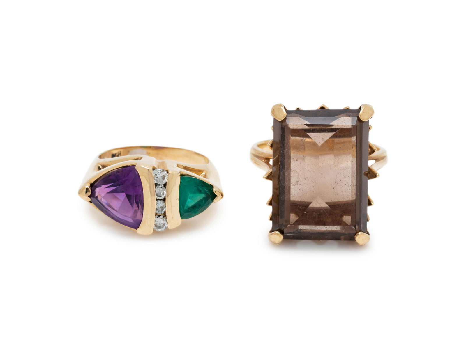 COLLECTION OF GOLD AND MULTIGEM RINGS: COLLECTION OF GOLD AND MULTIGEM RINGS Consisting of a ring containing one triangular cut amethyst measuring approximately 8.80 x 8.00 mm, one triangular cut emerald measuring approximately 6.00 x 6.00