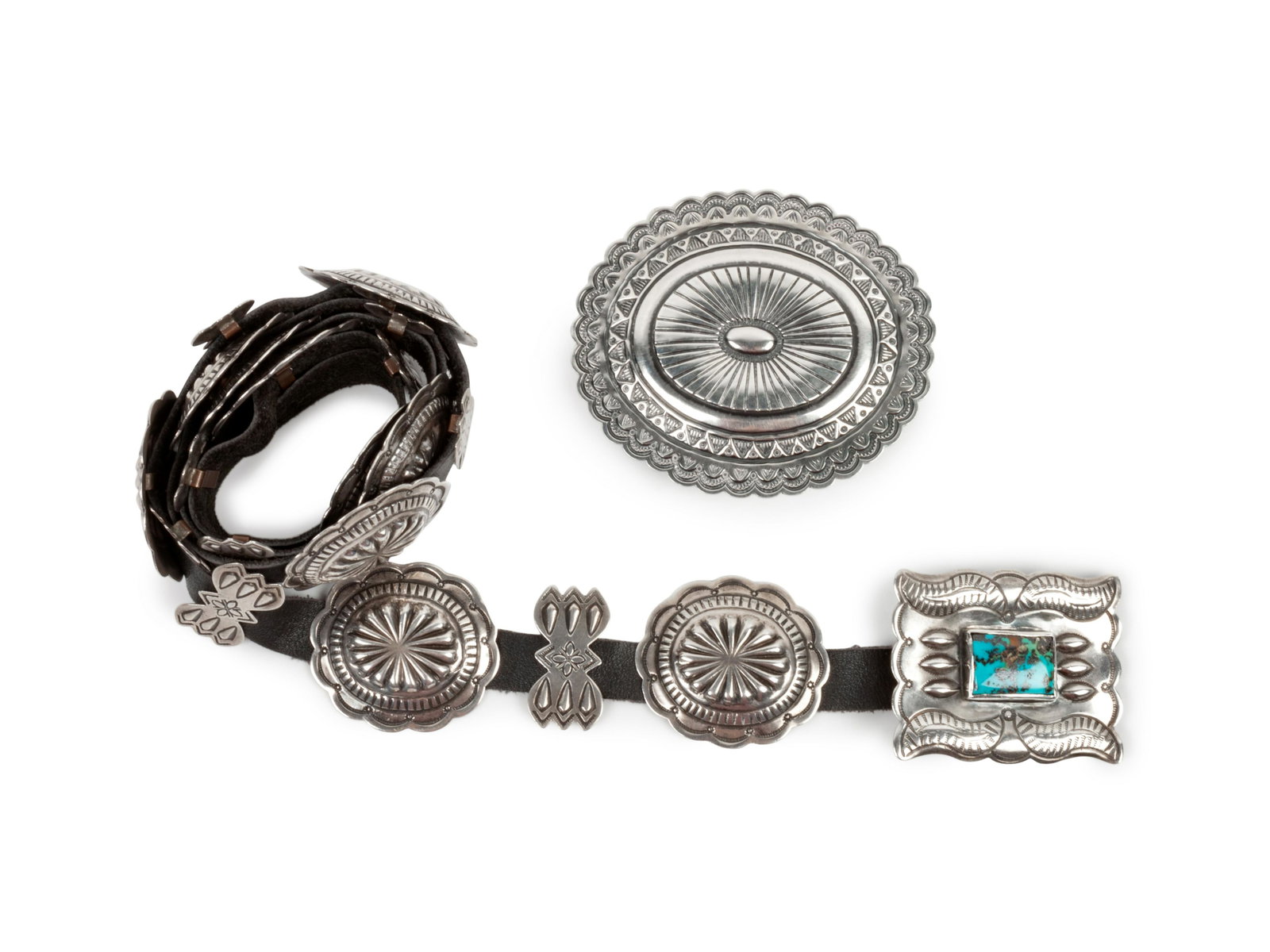 Arnold Blackgoat (DINE, 20TH CENTURY) Sterling Silver: Arnold Blackgoat (DINE, 20TH CENTURY) Sterling Silver Belt Buckle, PLUS lot of 2, includes a sterling silver Navajo Belt Buckle, stamped BLKOT; AND a silver and Pilot Mountain turquoise concha belt,