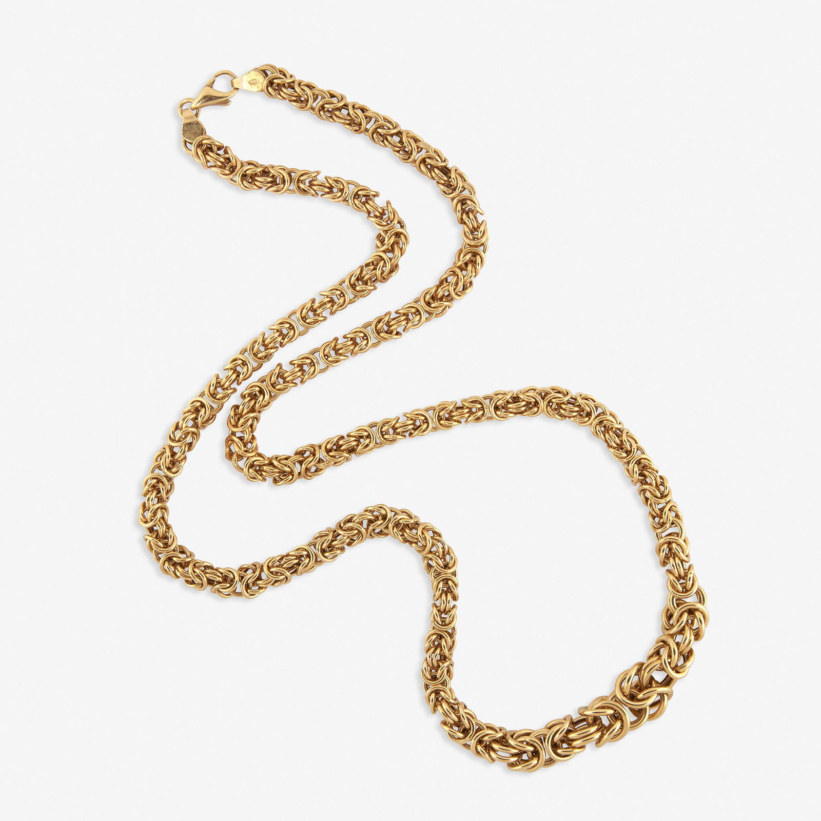 A fourteen karat gold necklace, Italy: A fourteen karat gold necklace Italy designed as a graduated Byzantine chain. 21.1 dwt.; Length: 24 1/2 in.