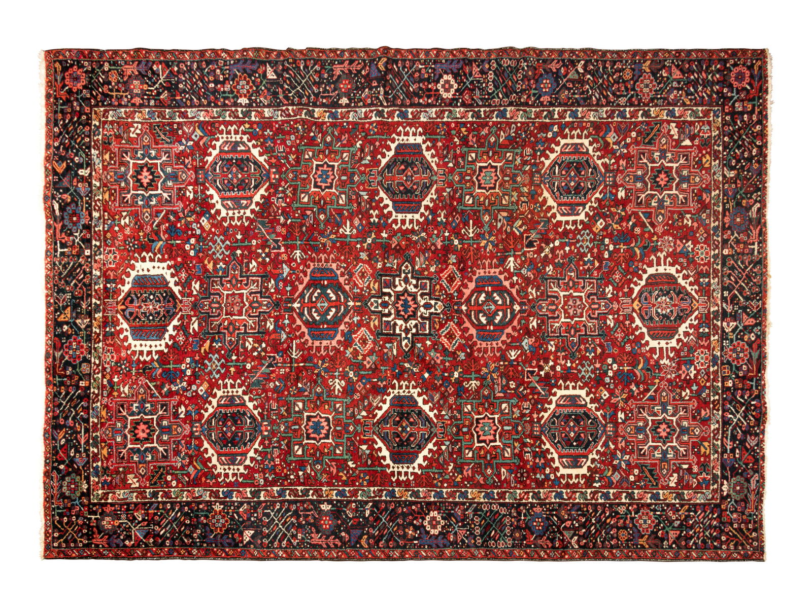 A Persian Wool Rug: A Persian Wool Rug 20th Century 10 feet 10 inches x 7 feet 6 inches. Property from the Collection of Pat and Hugh Bolan, Grand Haven, Michigan