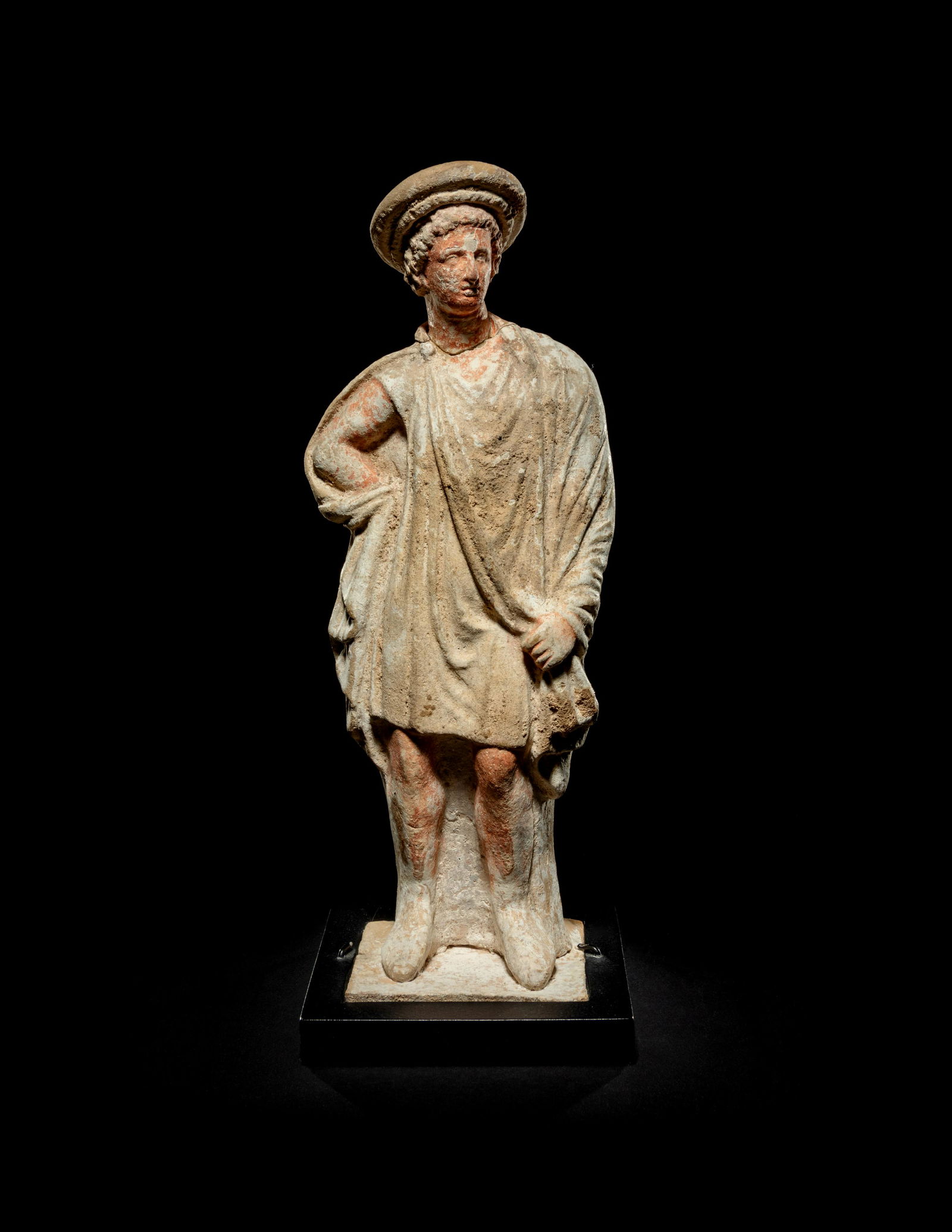 A Greek Painted Terra Cotta Male Figure (1 of 2)