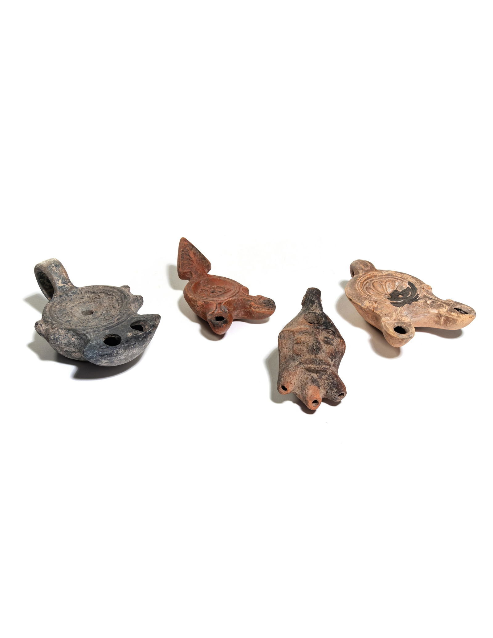 Five Roman Molded Terra Cotta Oil Lamps Width of (1 of 2)