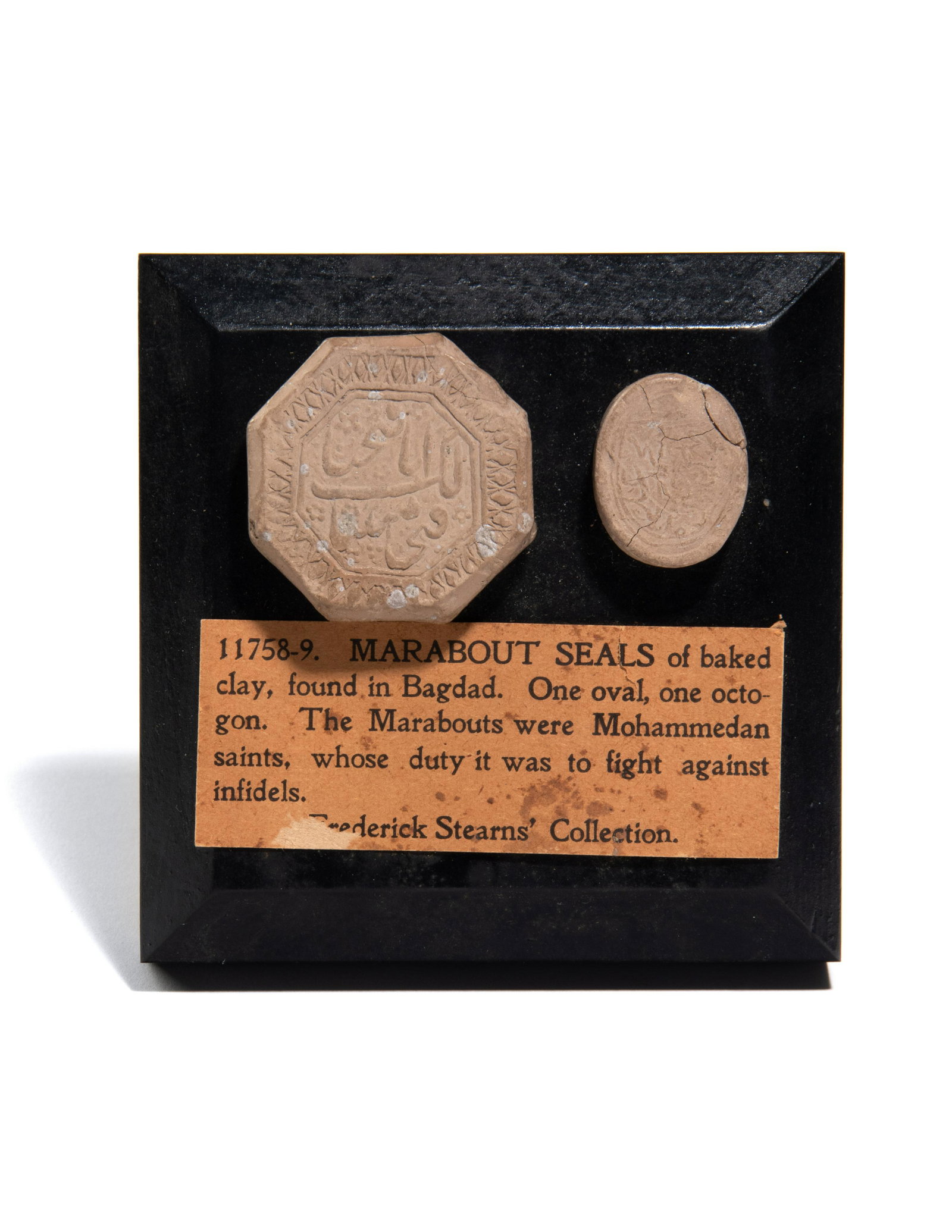 Two Islamic Pottery Turbahs or Seals Mounted on a: Two Islamic Pottery Turbahs or Seals Mounted on a Plaque 19th Century Property of the Detroit Institute of Arts, sold to benefit the Acquisitions Fund
