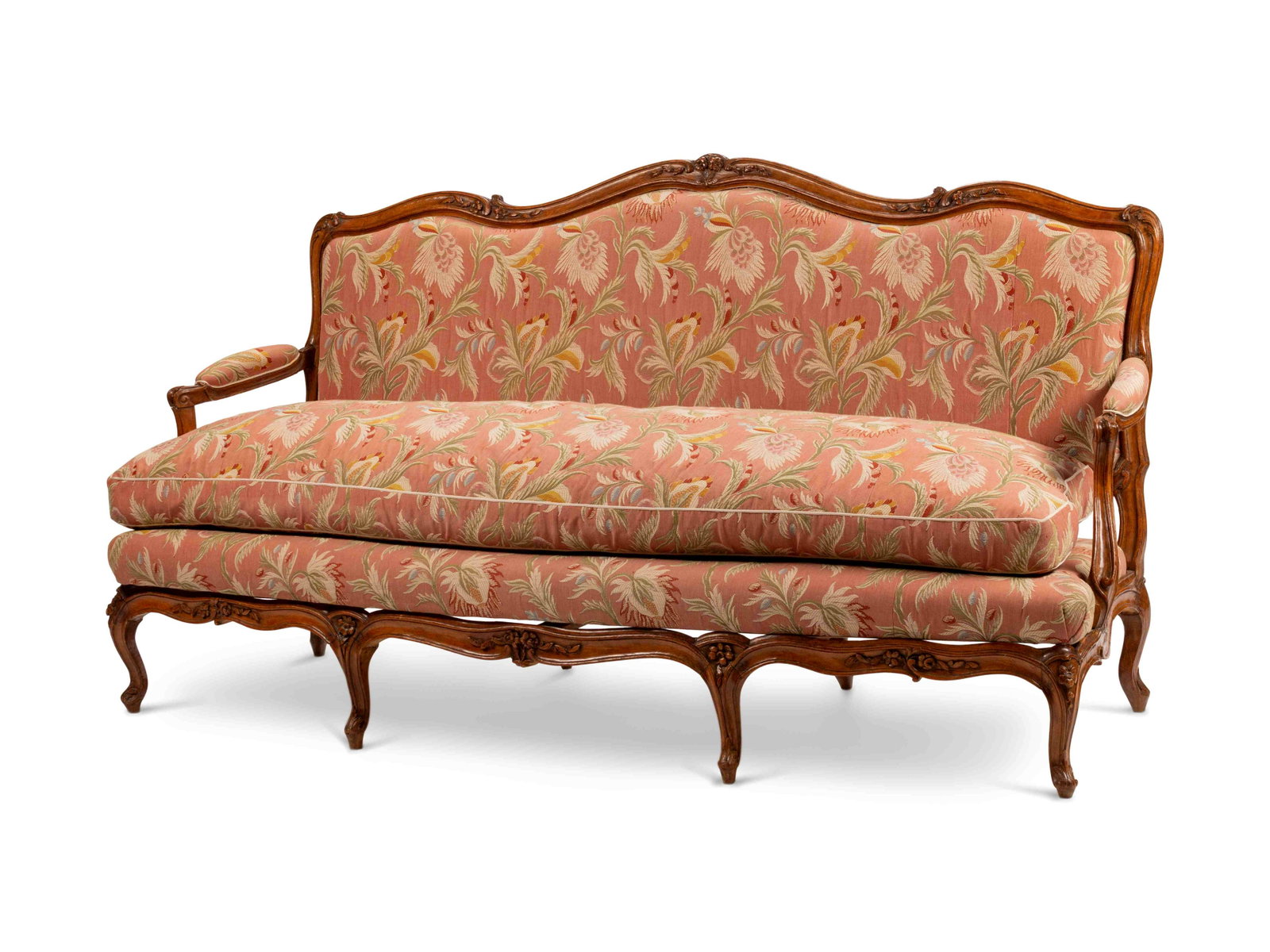 A Louis XV Provincial Carved Walnut Canape Height 40 x: A Louis XV Provincial Carved Walnut Canape 19TH CENTURY Height 40 x length 77 1/2 x depth 26 inches.