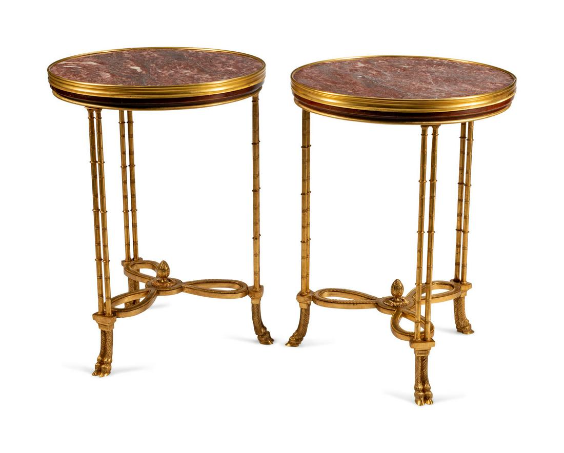 A Pair of Directoire Style Gilt-Bronze and Marble: A Pair of Directoire Style Gilt-Bronze and Marble Gueridons Height 29 1/2 x diameter 21 1/2 inches.