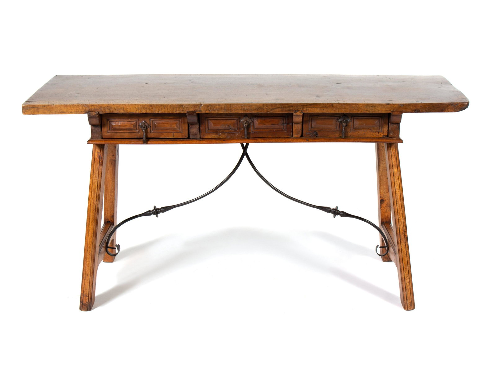 A Spanish Baroque Style Walnut Trestle Table Height 31: A Spanish Baroque Style Walnut Trestle Table INCORPORATING ANTIQUE ELEMENTS Height 31 7/8 x length 64 x depth 24 1/2 inches.