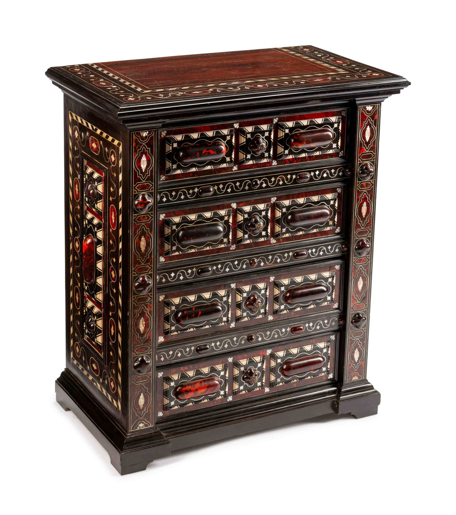 A Portuguese Ebony and Mother-of-Pearl-Inlaid Chest of: A Portuguese Ebony and Mother-of-Pearl-Inlaid Chest of Drawers 19TH CENTURY Height 40 1/2 x width 34 1/2 x depth 20 inches.