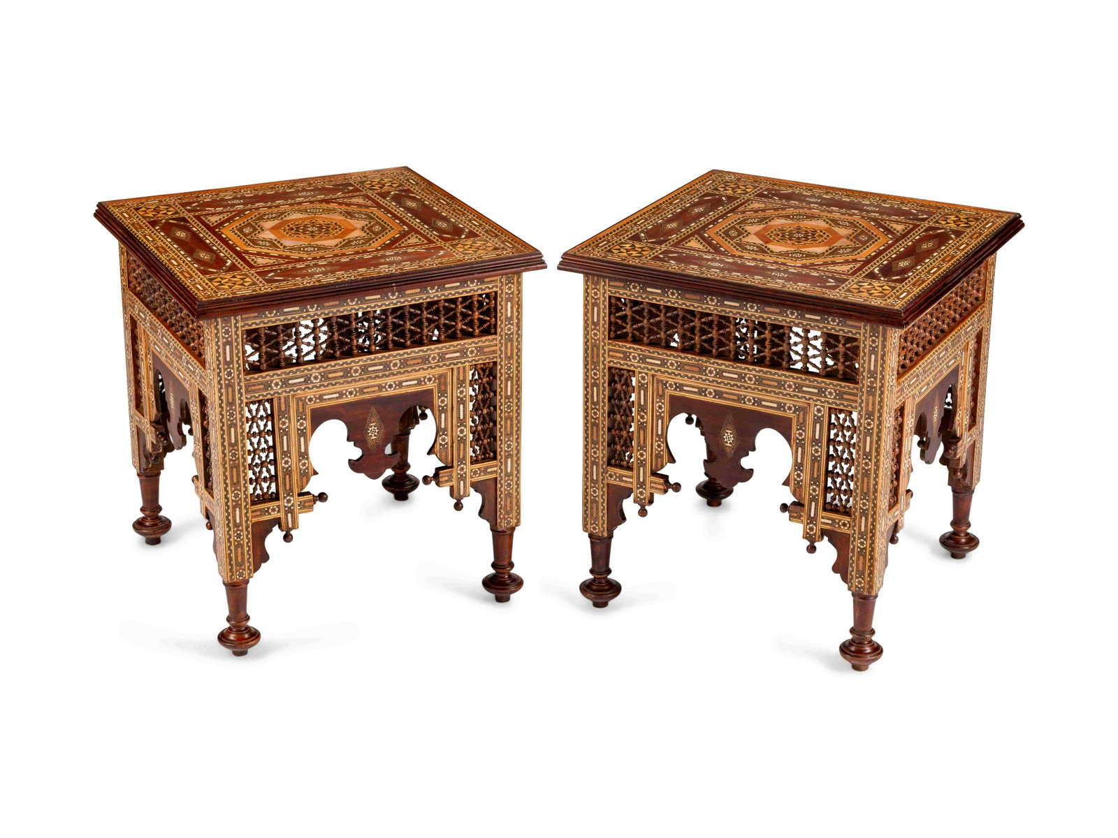 A Pair of Moorish Style Inlaid Mixed Wood Side Tables: A Pair of Moorish Style Inlaid Mixed Wood Side Tables Height 26 1/2 x width 24 1/2 x depth 24 1/2 inches.