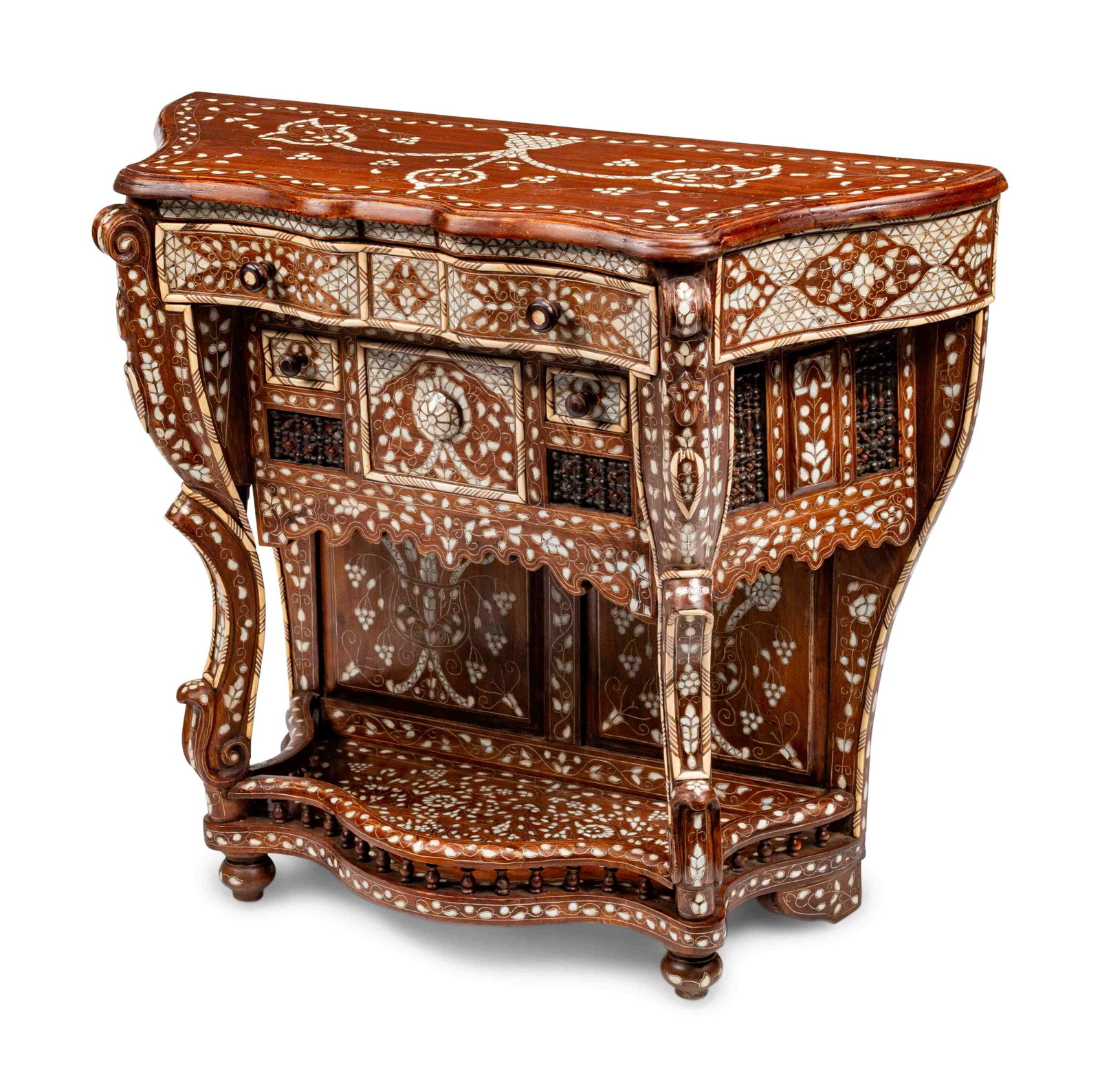 A Syrian Pewter and Mother-of-Pearl-Inlaid Console: A Syrian Pewter and Mother-of-Pearl-Inlaid Console Height 36 x length 41 1/2 x depth 16 inches.